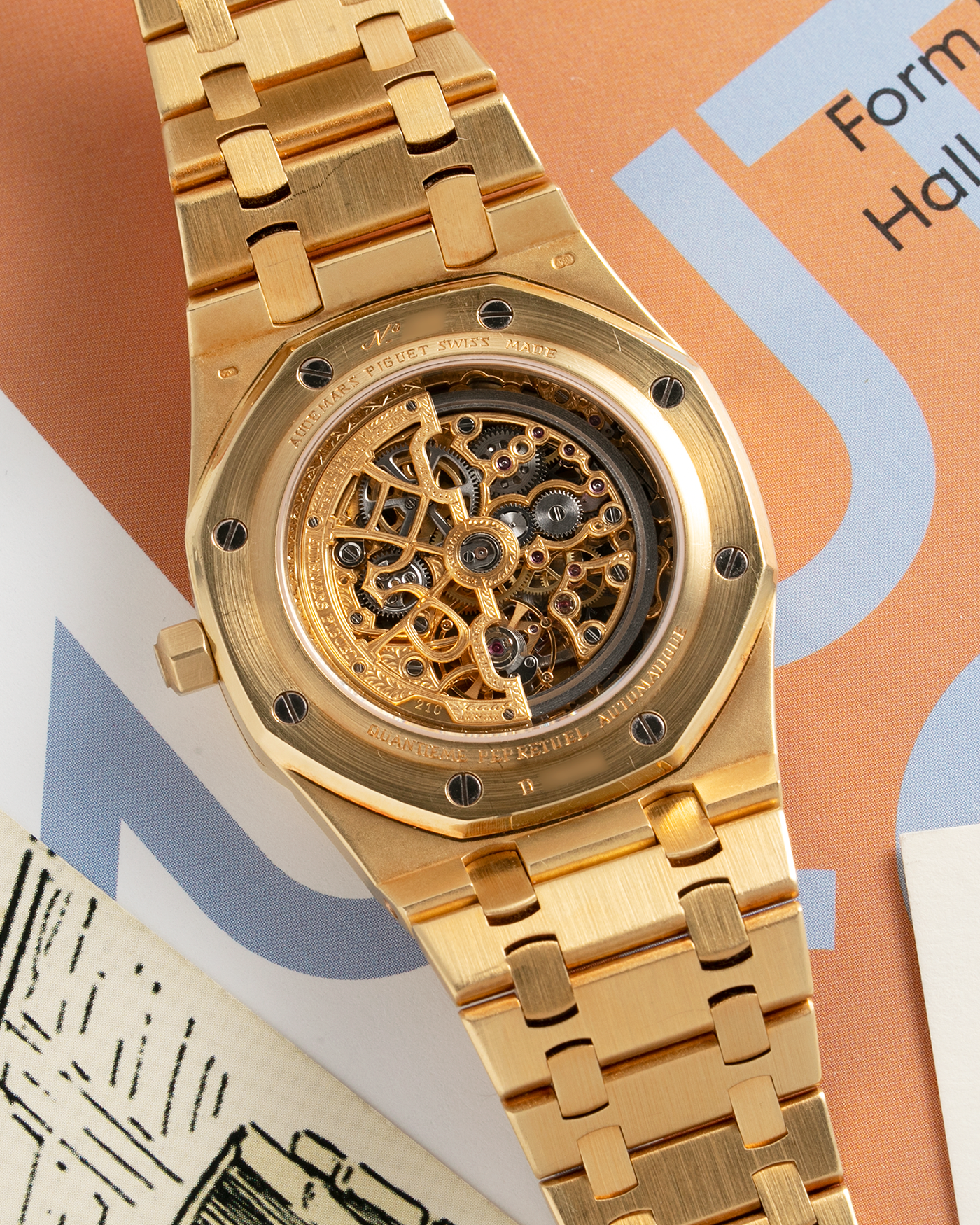 Brand: Audemars Piguet Year: 1990’s Model: Royal Oak Perpetual Calendar Quantieme Openworked Skeleton Reference Number: 25636BA Material: 18k Yellow Gold Movement: Cal. 2120/2800 Case Diameter: 39mm Bracelet: 18k Yellow Gold Audemars Piguet Integrated Bracelet