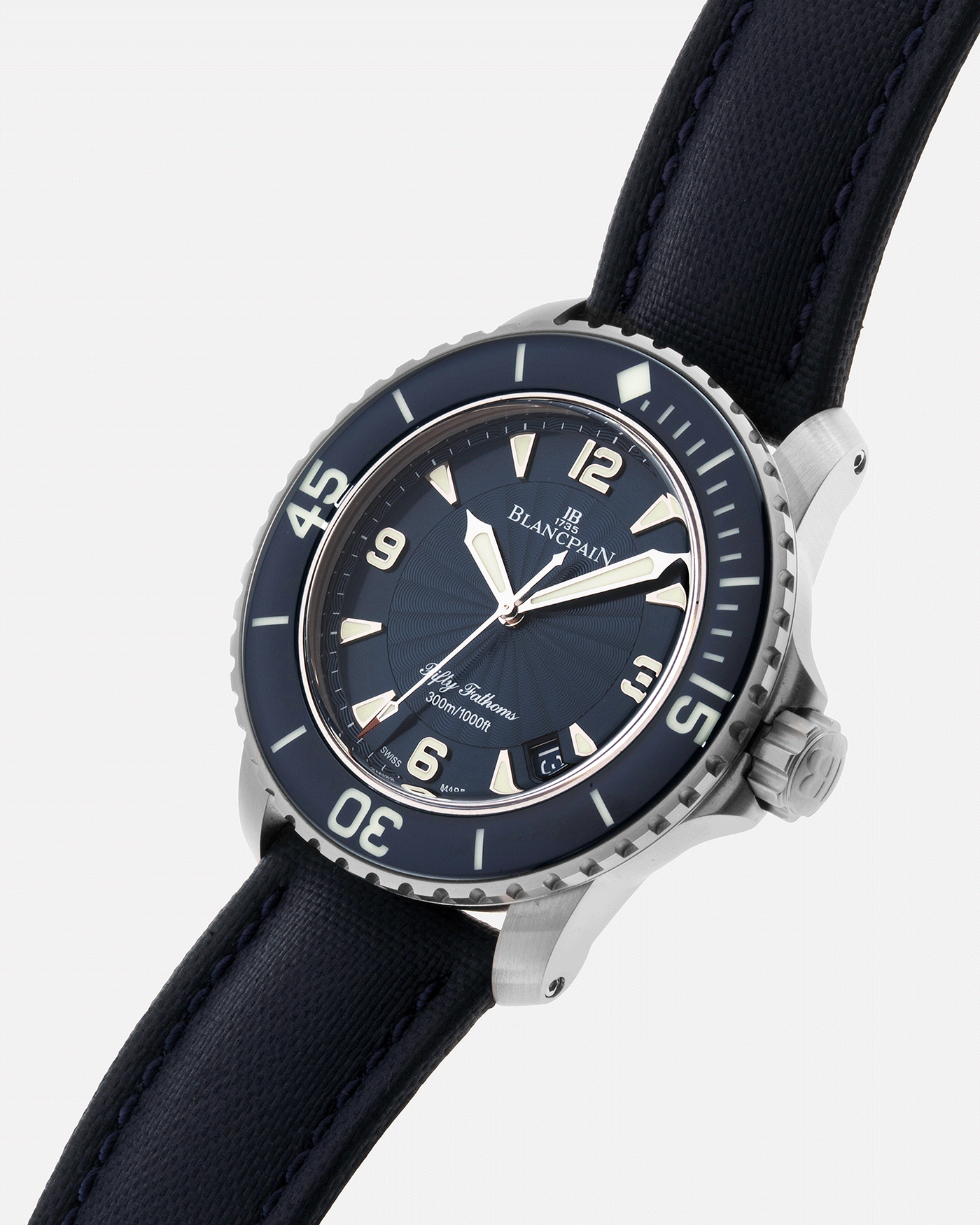 Brand: Blancpain Year: 2015 Model: Fifty Fathoms Reference Number: 5015D-1140-52B  Material: Stainless Steel Movement: Cal. 1315 Case Diameter: 45mm Bracelet/Strap: Blancpain Blue Rubberised Sailcloth Strap