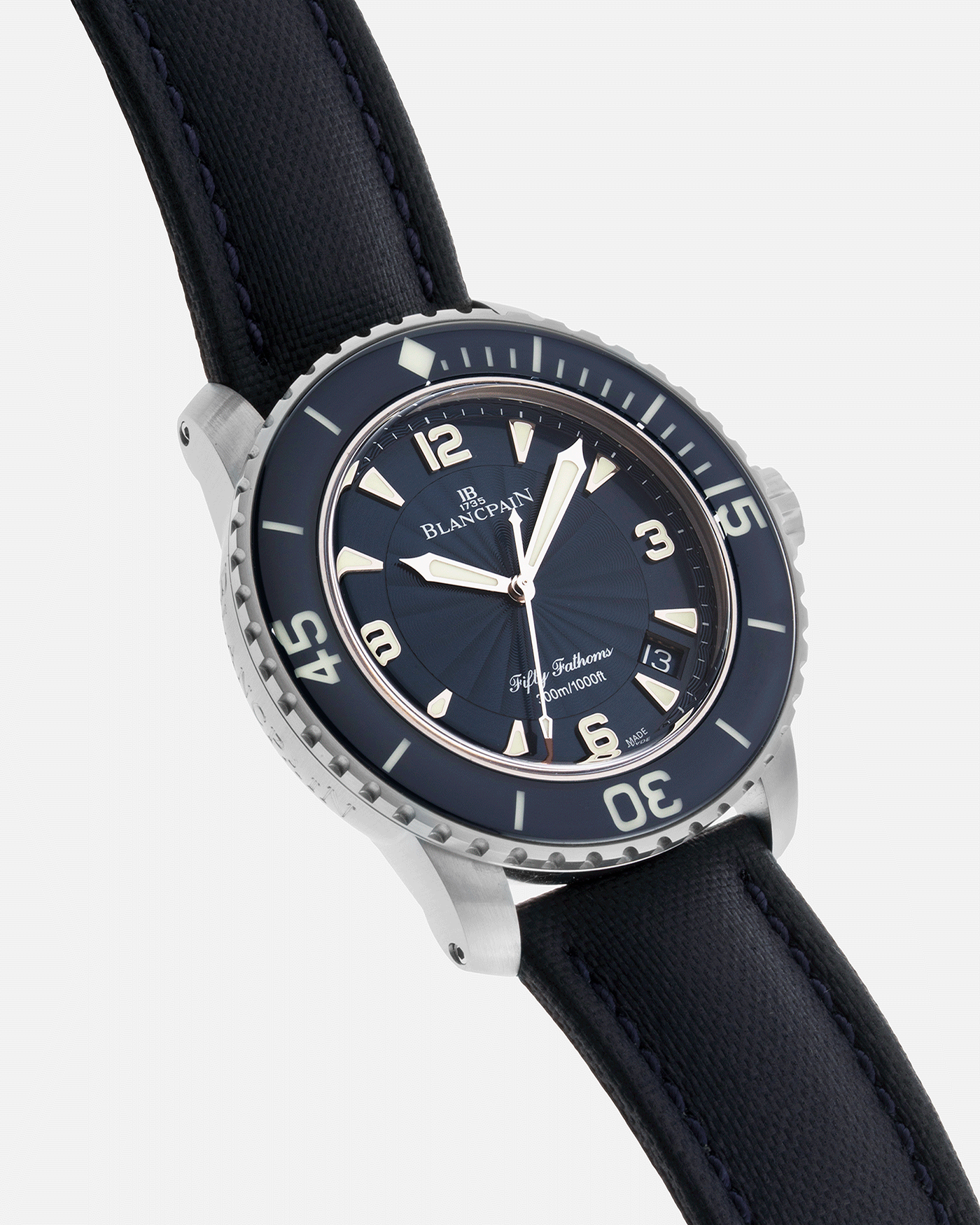 Brand: Blancpain Year: 2015 Model: Fifty Fathoms Reference Number: 5015D-1140-52B  Material: Stainless Steel Movement: Cal. 1315 Case Diameter: 45mm Bracelet/Strap: Blancpain Blue Rubberised Sailcloth Strap