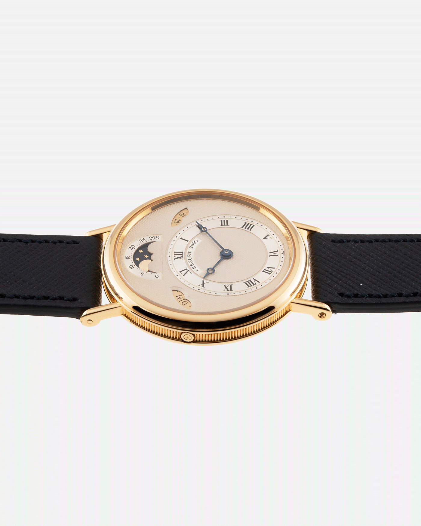 Brand: Breguet Year: 1990’s Model: 3337 Material: 18k Yellow Gold Movement: Breguet Cal. 502 Case Diameter: 36mm Strap: Molequin Navy Blue Textured Calf with 18k Yellow Gold Breguet Tang Buckle