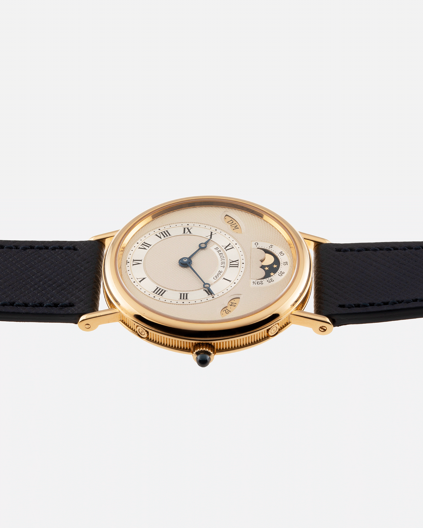 Brand: Breguet Year: 1990’s Model: 3337 Material: 18k Yellow Gold Movement: Breguet Cal. 502 Case Diameter: 36mm Strap: Molequin Navy Blue Textured Calf with 18k Yellow Gold Breguet Tang Buckle