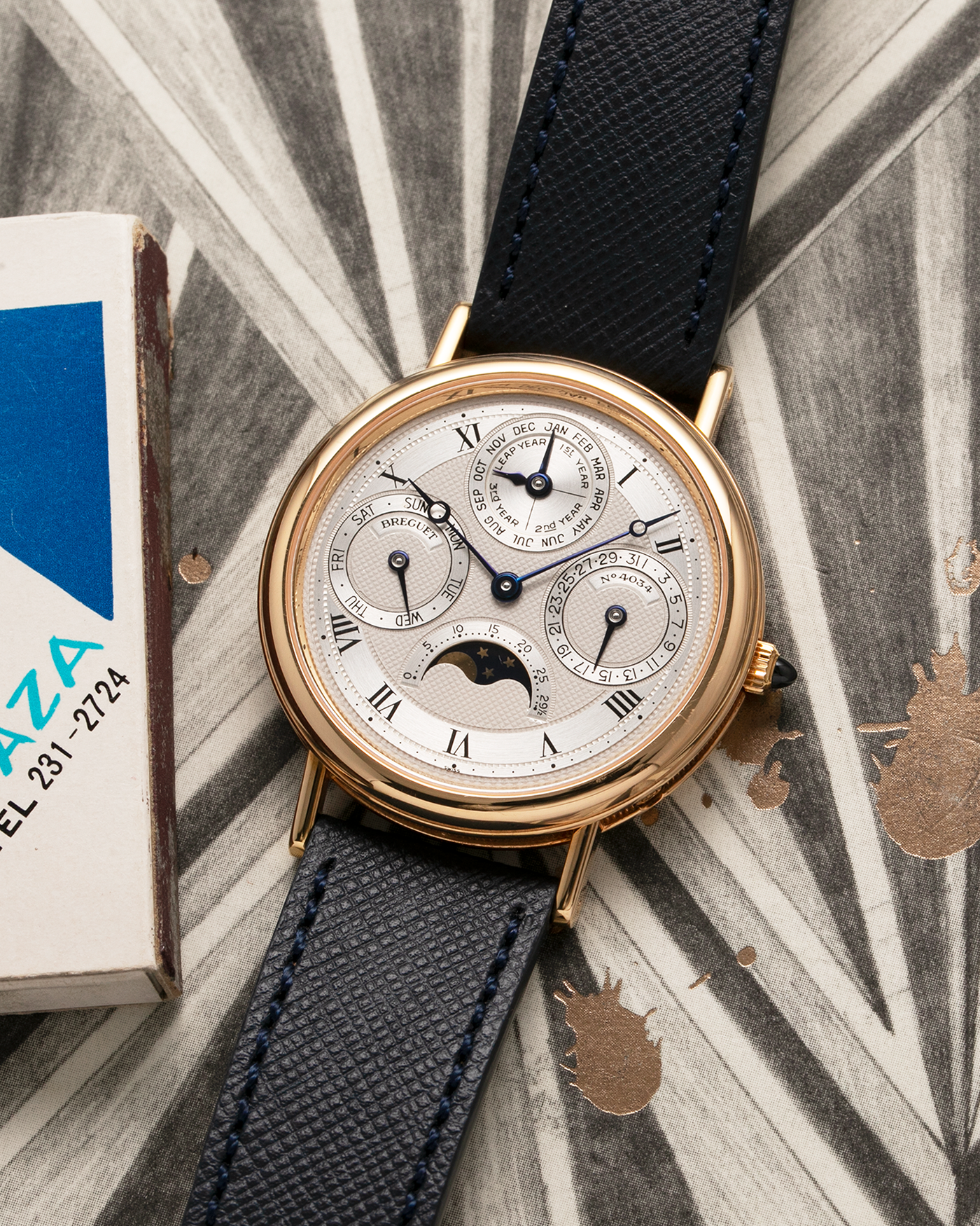 Brand: Breguet Year: 1990’s Model: 3050 Perpetual Calendar Material: 18k Yellow Gold Movement: Breguet Self Winding Perpetual Calendar Case Diameter: 36mm Strap: Molequin Navy Blue Textured Calf with 18k Yellow Gold Breguet Tang Buckle