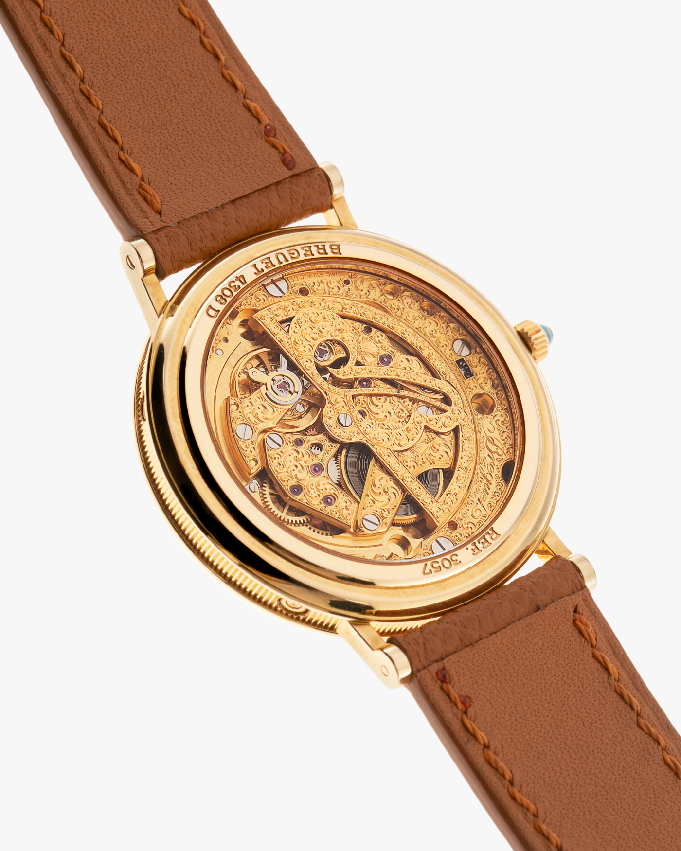 Brand: Breguet Year: 1990’s Model: 3057 Perpetual Calendar Material: 18k Yellow Gold Movement: Breguet Self Winding Perpetual Calendar Case Diameter: 36mm Strap: Chestnut Brown Leather Strap with 18k Yellow Gold Breguet Tang Buckle