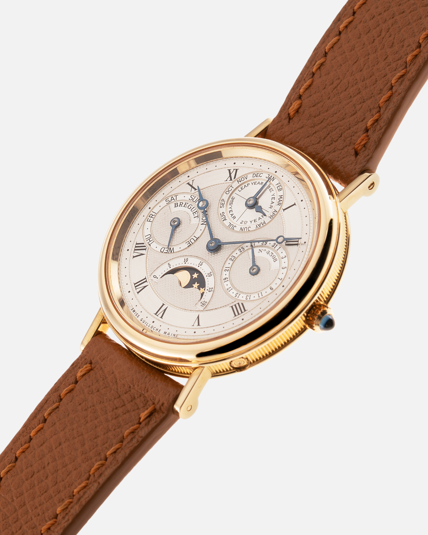 Brand: Breguet Year: 1990’s Model: 3057 Perpetual Calendar Material: 18k Yellow Gold Movement: Breguet Self Winding Perpetual Calendar Case Diameter: 36mm Strap: Chestnut Brown Leather Strap with 18k Yellow Gold Breguet Tang Buckle