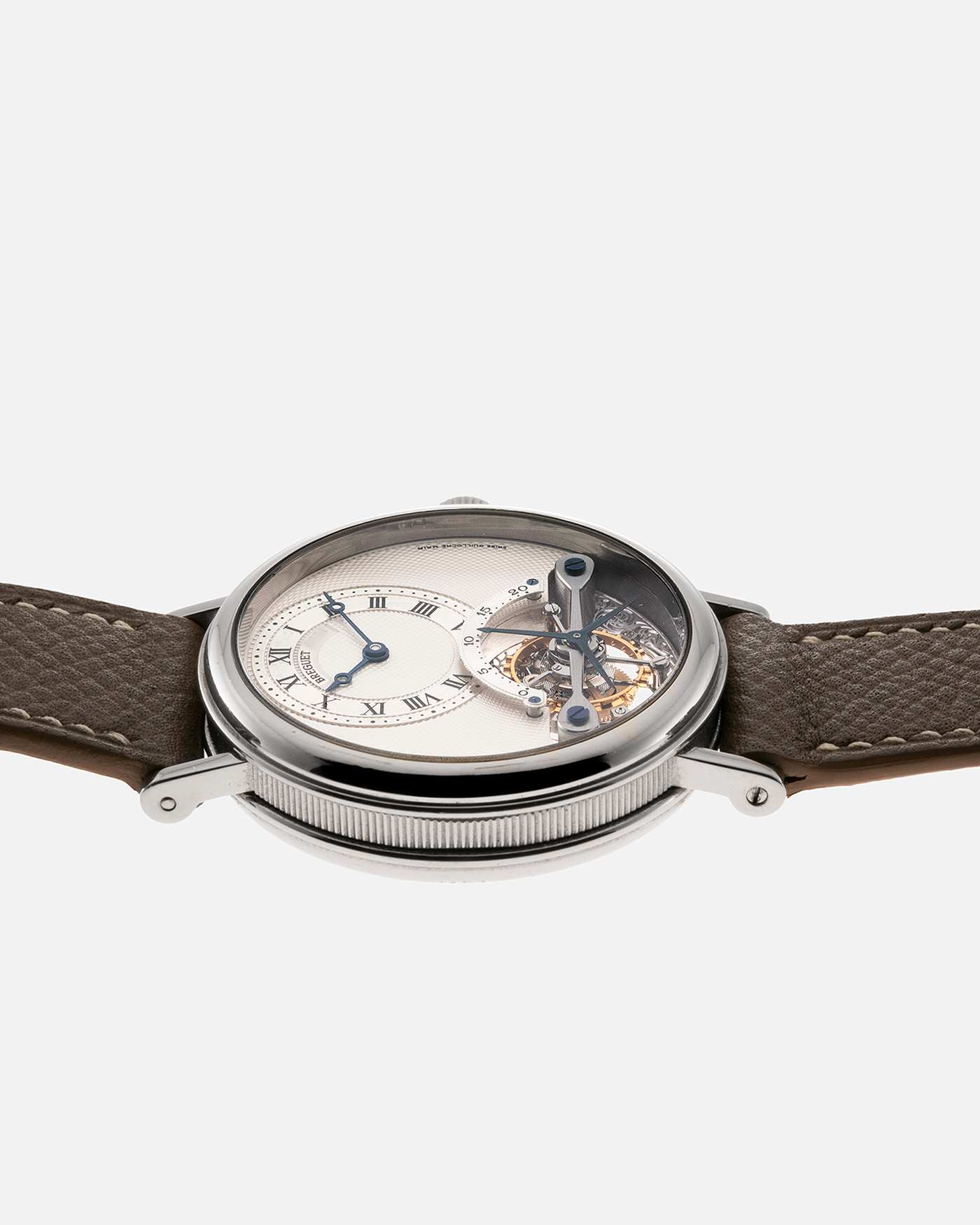 Brand: Breguet Year: 1990’s Model: Classique Tourbillon Reference: 3357 Material: 18-carat White Gold Movement: Breguet Cal. 558, Self-Winding Case Diameter: 36mm Strap: Taupe Calf Grained Strap with Signed 18-carat White Gold Deployant Clasp