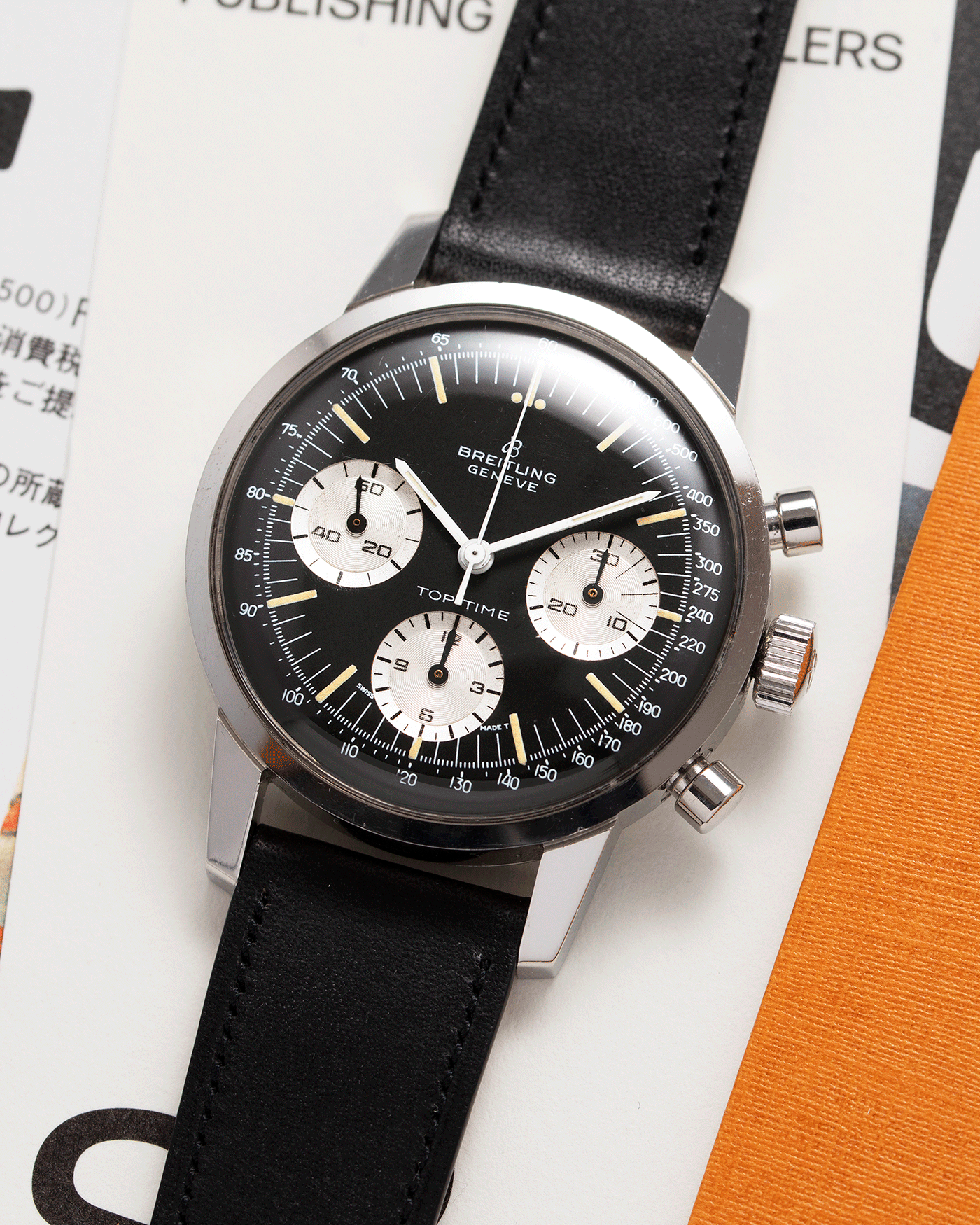 Brand: Breitling Year: 1960’s Model: Top Time Reference Number: 810 Material: Stainless Steel Movement: Manually wound Venus 178 Case Diameter: 38mm Lug Width: 18mm Bracelet/Strap: Nostime Black Calf