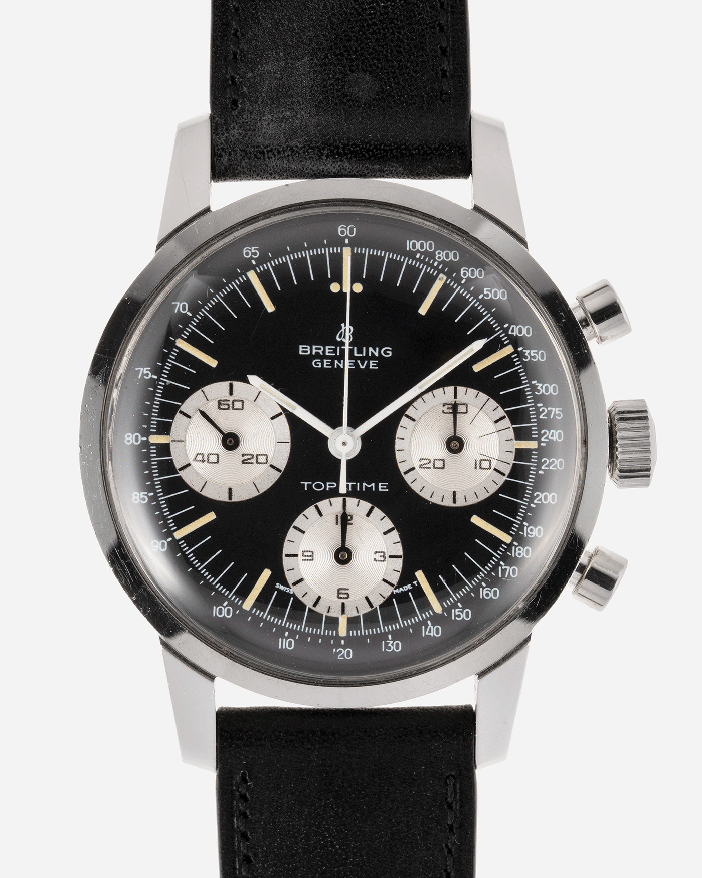 Brand: Breitling Year: 1960’s Model: Top Time Reference Number: 810 Material: Stainless Steel Movement: Manually wound Venus 178 Case Diameter: 38mm Lug Width: 18mm Bracelet/Strap: Nostime Black Calf