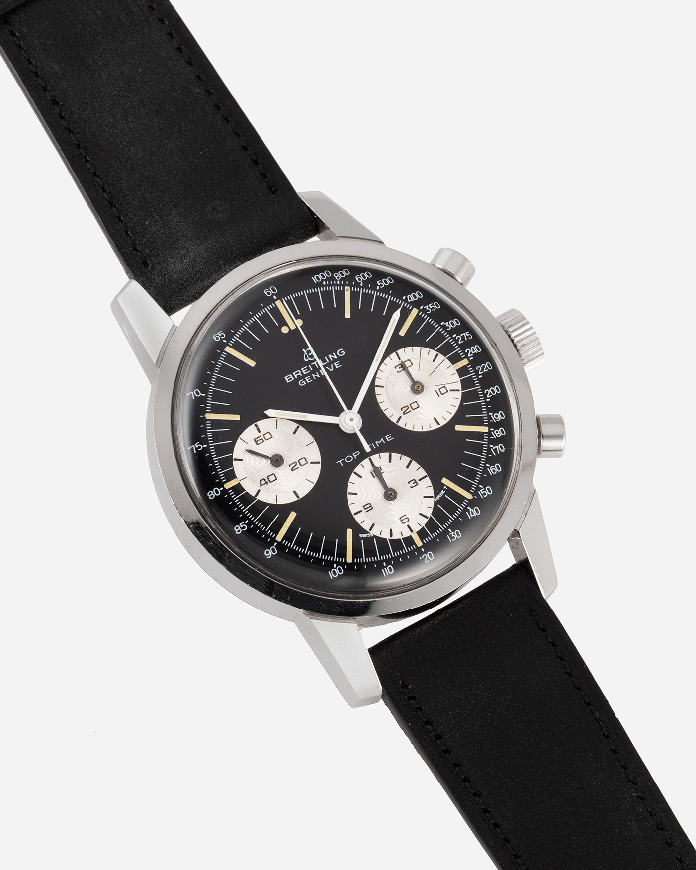 Brand: Breitling Year: 1960’s Model: Top Time Reference Number: 810 Material: Stainless Steel Movement: Manually wound Venus 178 Case Diameter: 38mm Lug Width: 18mm Bracelet/Strap: Nostime Black Calf