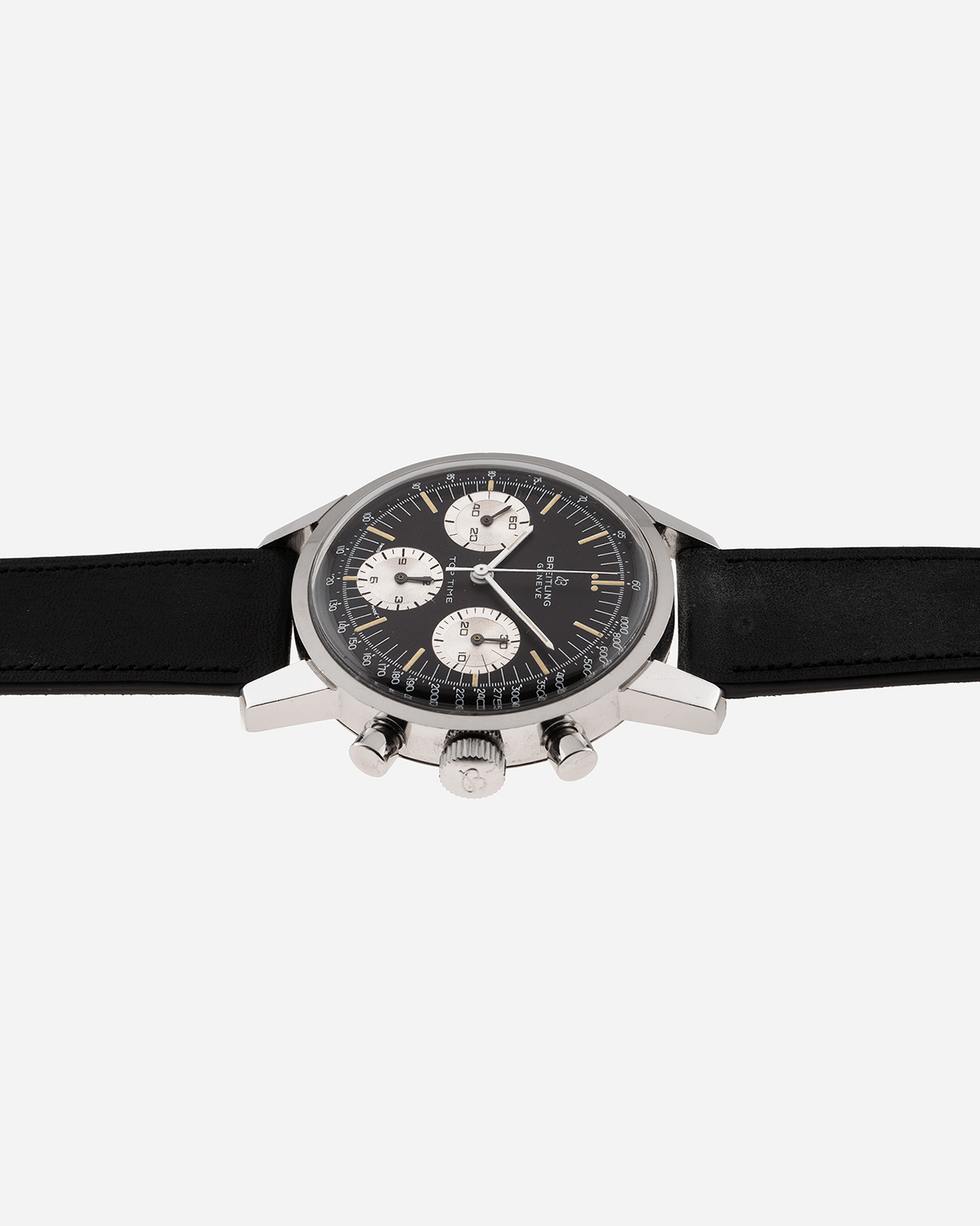 Brand: Breitling Year: 1960’s Model: Top Time Reference Number: 810 Material: Stainless Steel Movement: Manually wound Venus 178 Case Diameter: 38mm Lug Width: 18mm Bracelet/Strap: Nostime Black Calf