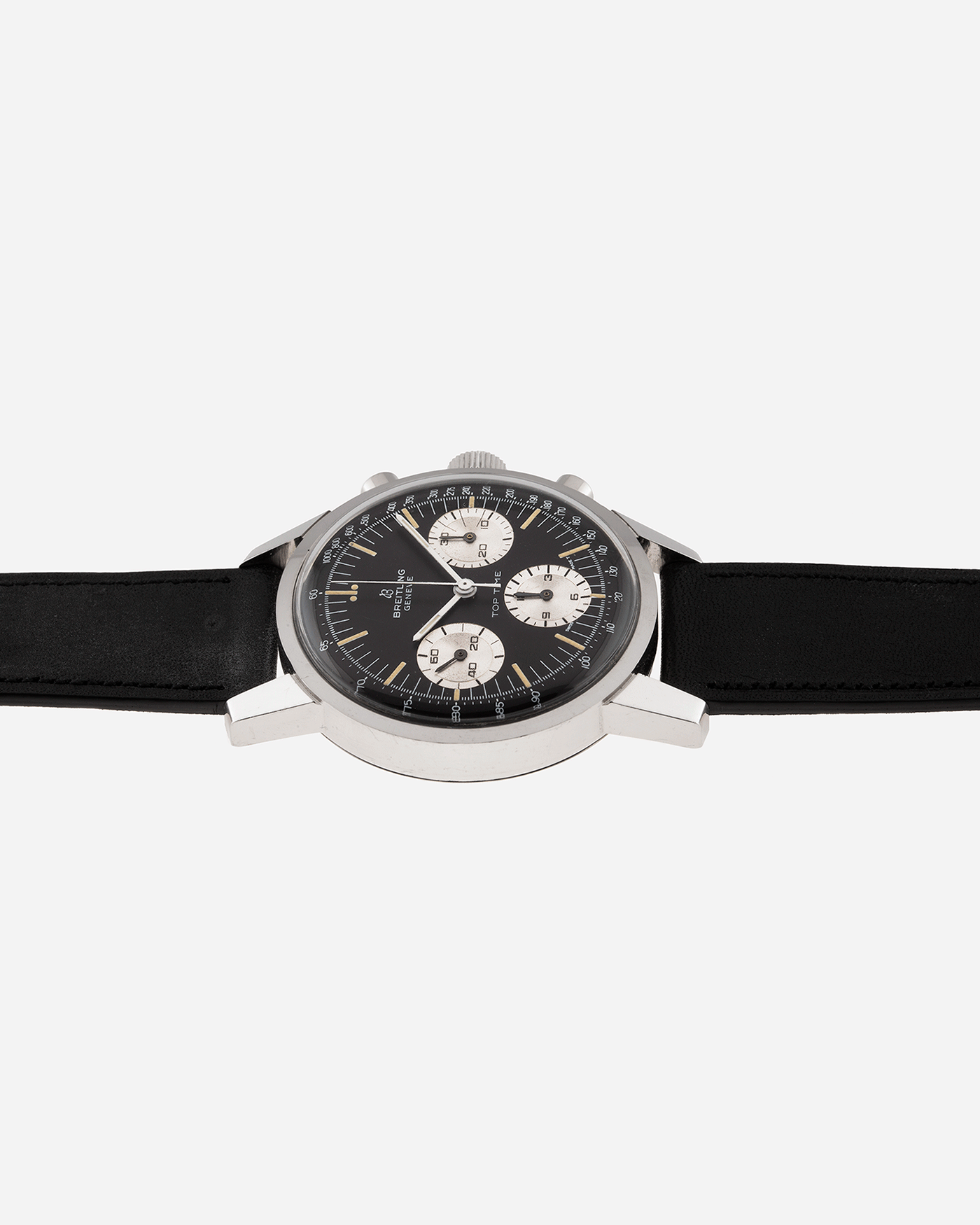 Brand: Breitling Year: 1960’s Model: Top Time Reference Number: 810 Material: Stainless Steel Movement: Manually wound Venus 178 Case Diameter: 38mm Lug Width: 18mm Bracelet/Strap: Nostime Black Calf