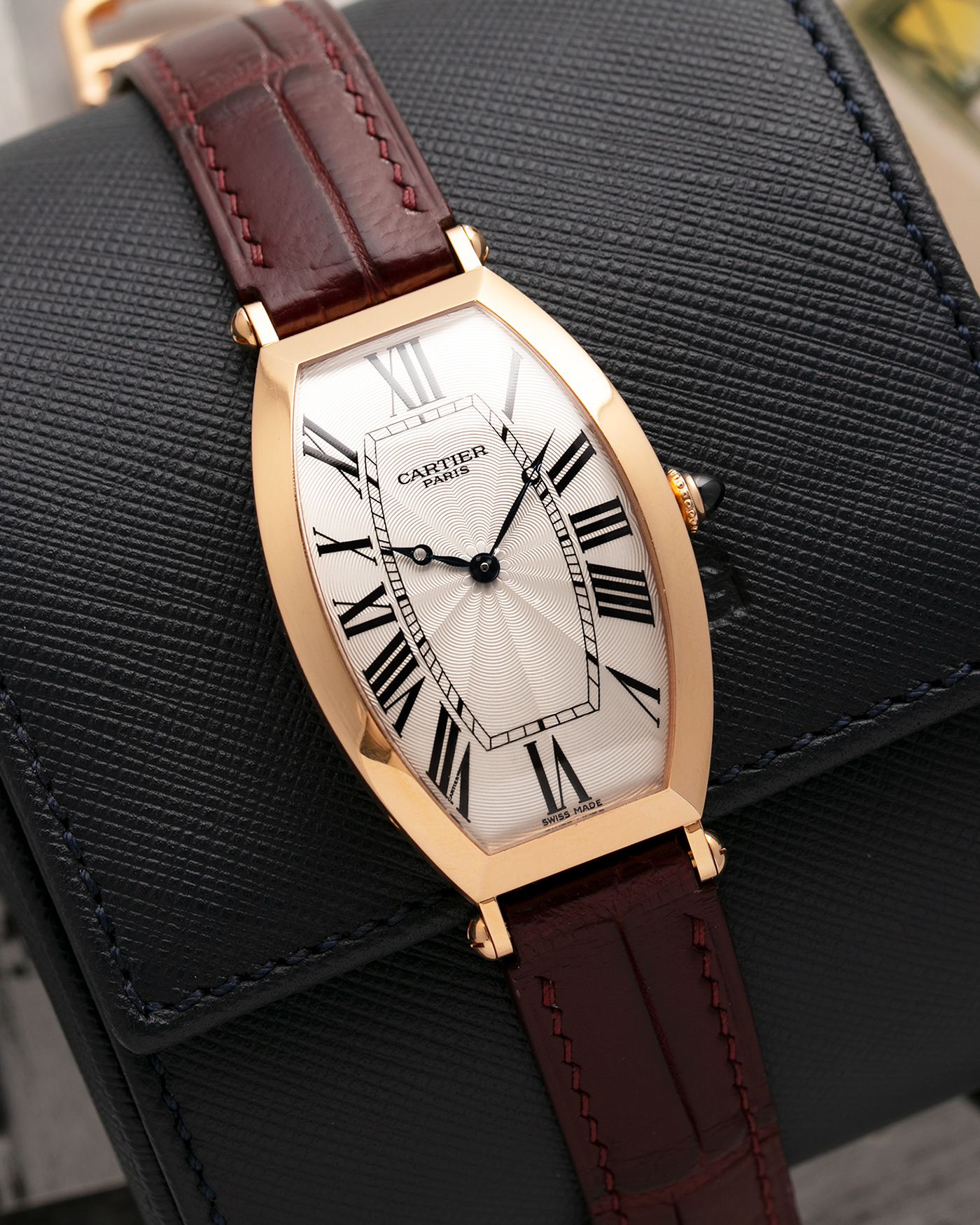 Brand: Cartier Year: 2006 Model: CPCP Collection Prive Tonneau XL Reference: 2802H Material: 18k Rose Gold Movement: Can 9790MC Case Diameter: 43.4mmX29.4mm Strap: Cartier Oxblood Alligator Strap with 18k Rose Gold Deployant Clasp