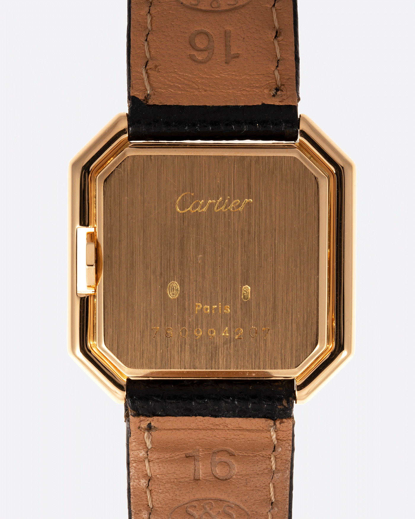 Brand: Cartier Year: 1970s Model: Ceinture Material: 18k Yellow Gold Movement: Manually Wound Cartier Cal. 78.1 Case Diameter: 25mm X 27mm Lug Width: 16mm Bracelet/Strap: Black Textured Leather Strap with Yellow Gold Cartier Buckle