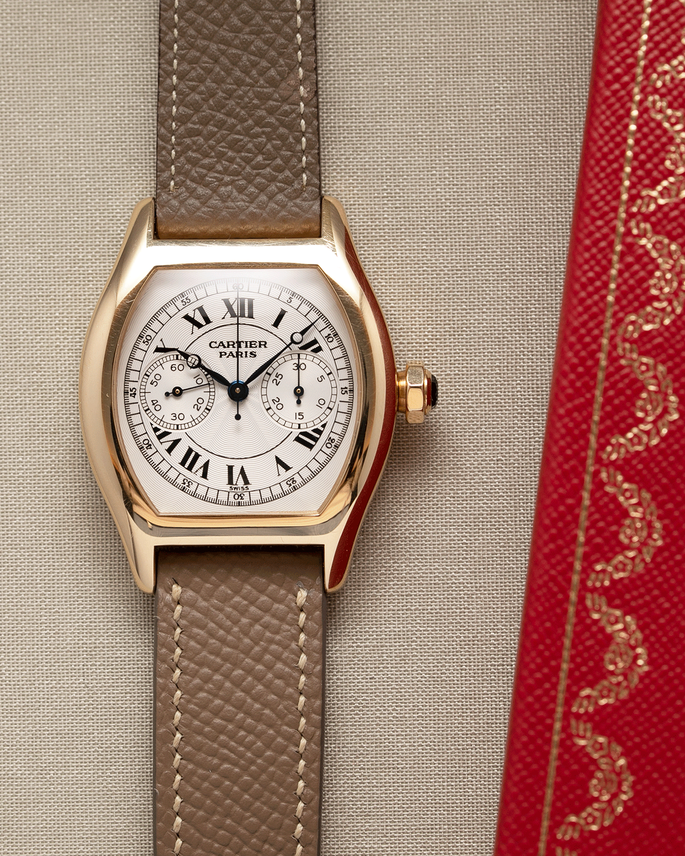 Brand: Cartier Year: 2000’s Model: CPCP Collection Prive Tortue Monopoussoir Reference: 2356E Material: 18k Yellow Gold Movement: THA Cal. 045MC Case Diameter: 43 x 35 mm Strap: Cartier Nostime Taupe Grained Calf with 18k Cartier Yellow Gold Deployant F.P. Journe