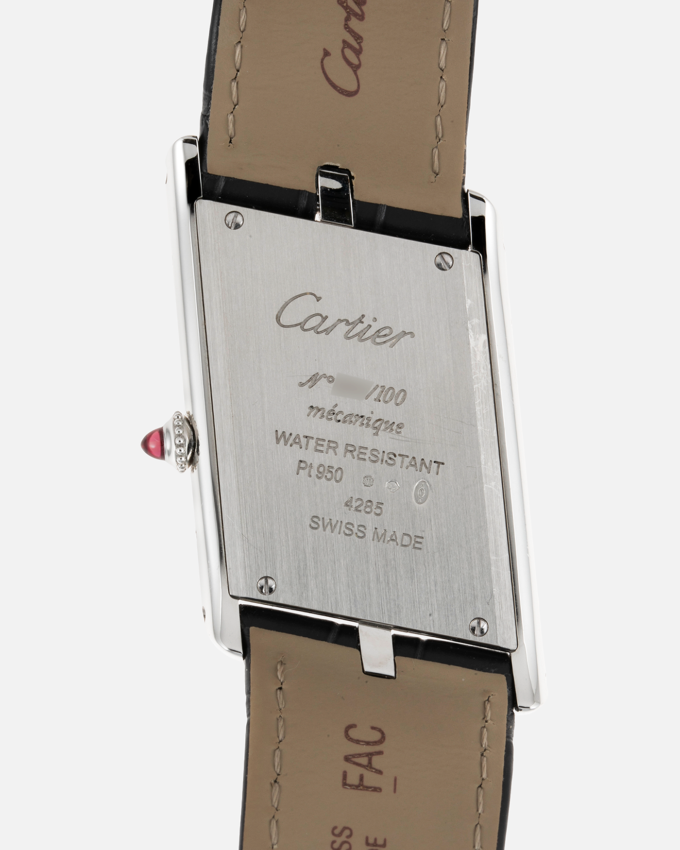 Brand: Cartier Year: 2020 Model: Privé Tank Asymétrique Platinum Reference: WGTA0042 Material: Platinum Movement: Cal. 1917MC, Manual-Winding Case Diameter: 47.15mm x 26.2mm x 6.38mm Strap: Cartier Grey Alligator Leather with Signed Tang Buckle  