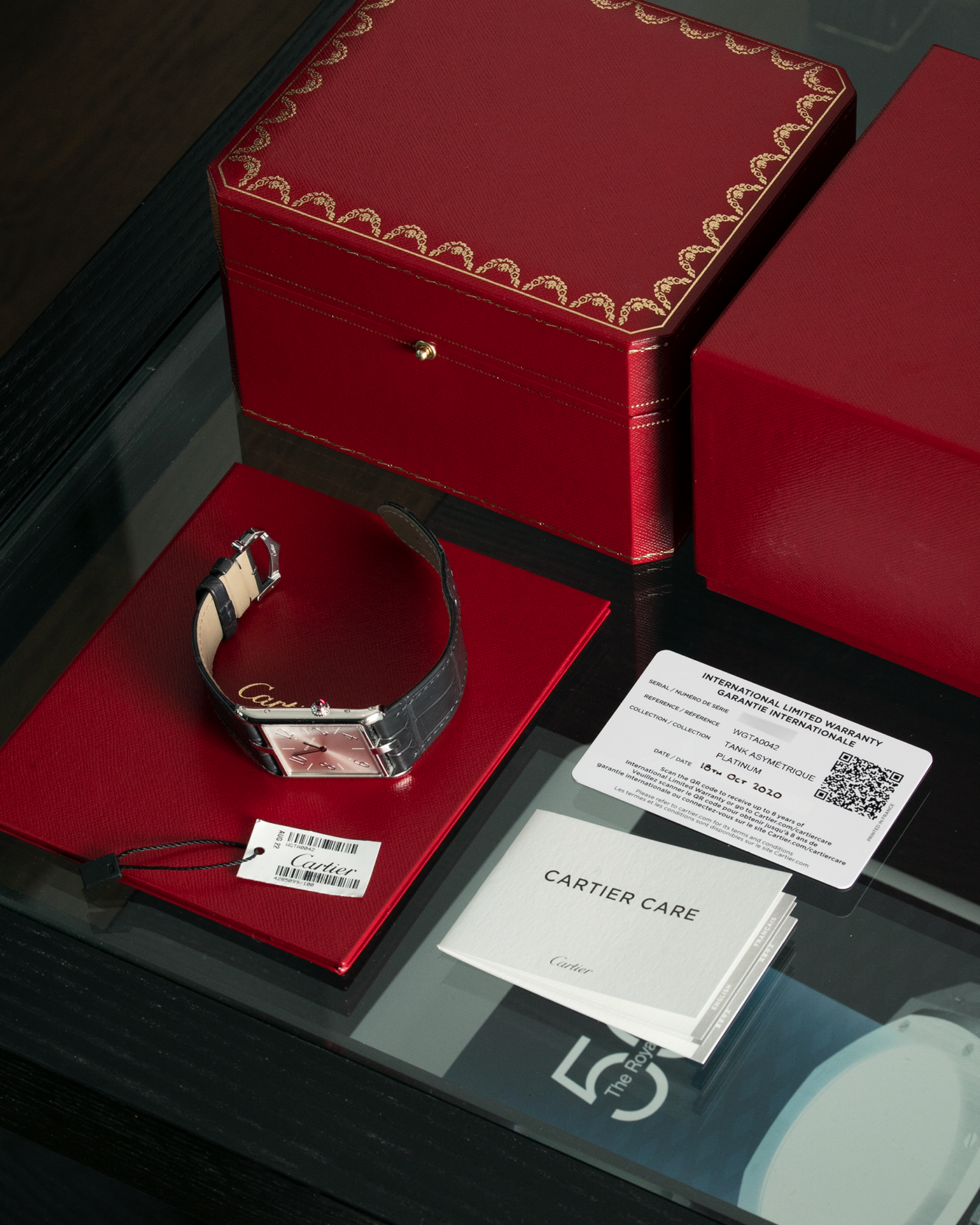 Brand: Cartier Year: 2020 Model: Privé Tank Asymétrique Platinum Reference: WGTA0042 Material: Platinum Movement: Cal. 1917MC, Manual-Winding Case Diameter: 47.15mm x 26.2mm x 6.38mm Strap: Cartier Grey Alligator Leather with Signed Tang Buckle  