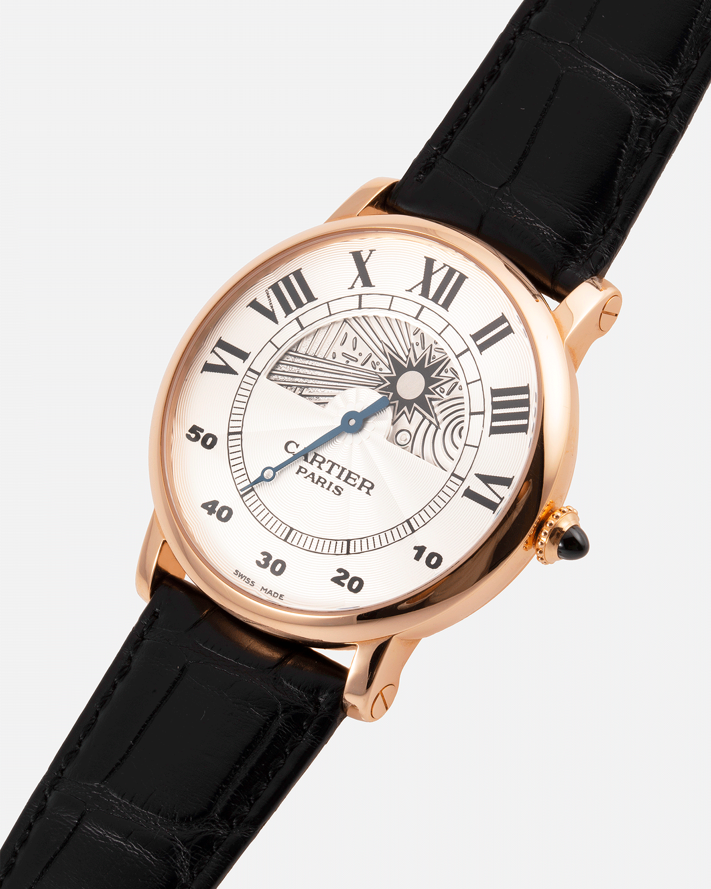 Brand: Cartier Year: 2000’s Model: CPCP Rotonde Jour Et Nuit Reference: 28721 Material: 18k Rose Gold Movement: Cal. 9903 MC Case Diameter: 42mm Strap: Black Cartier Alligator Strap with 18k Rose Gold Deployant