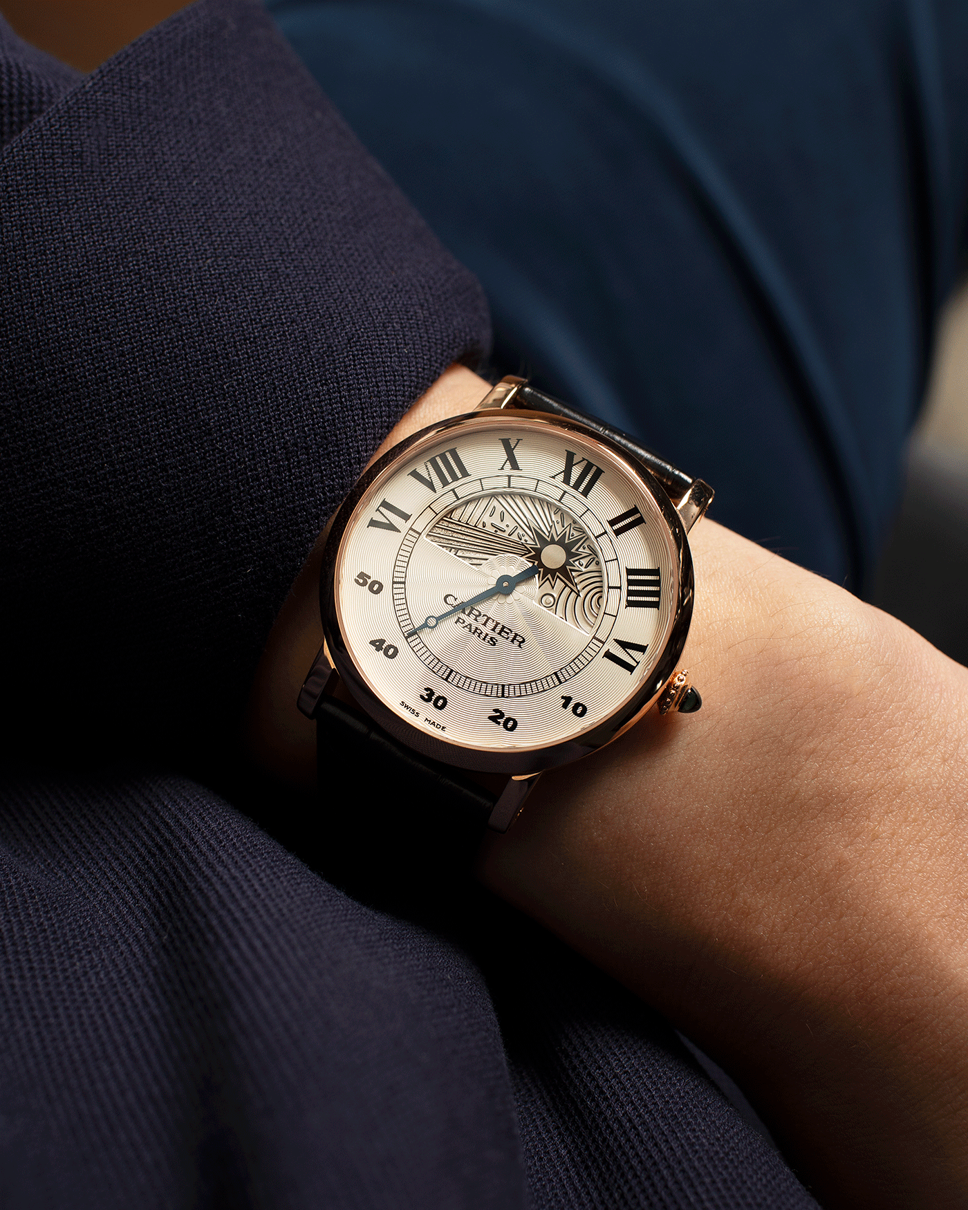 Brand: Cartier Year: 2000’s Model: CPCP Rotonde Jour Et Nuit Reference: 28721 Material: 18k Rose Gold Movement: Cal. 9903 MC Case Diameter: 42mm Strap: Black Cartier Alligator Strap with 18k Rose Gold Deployant
