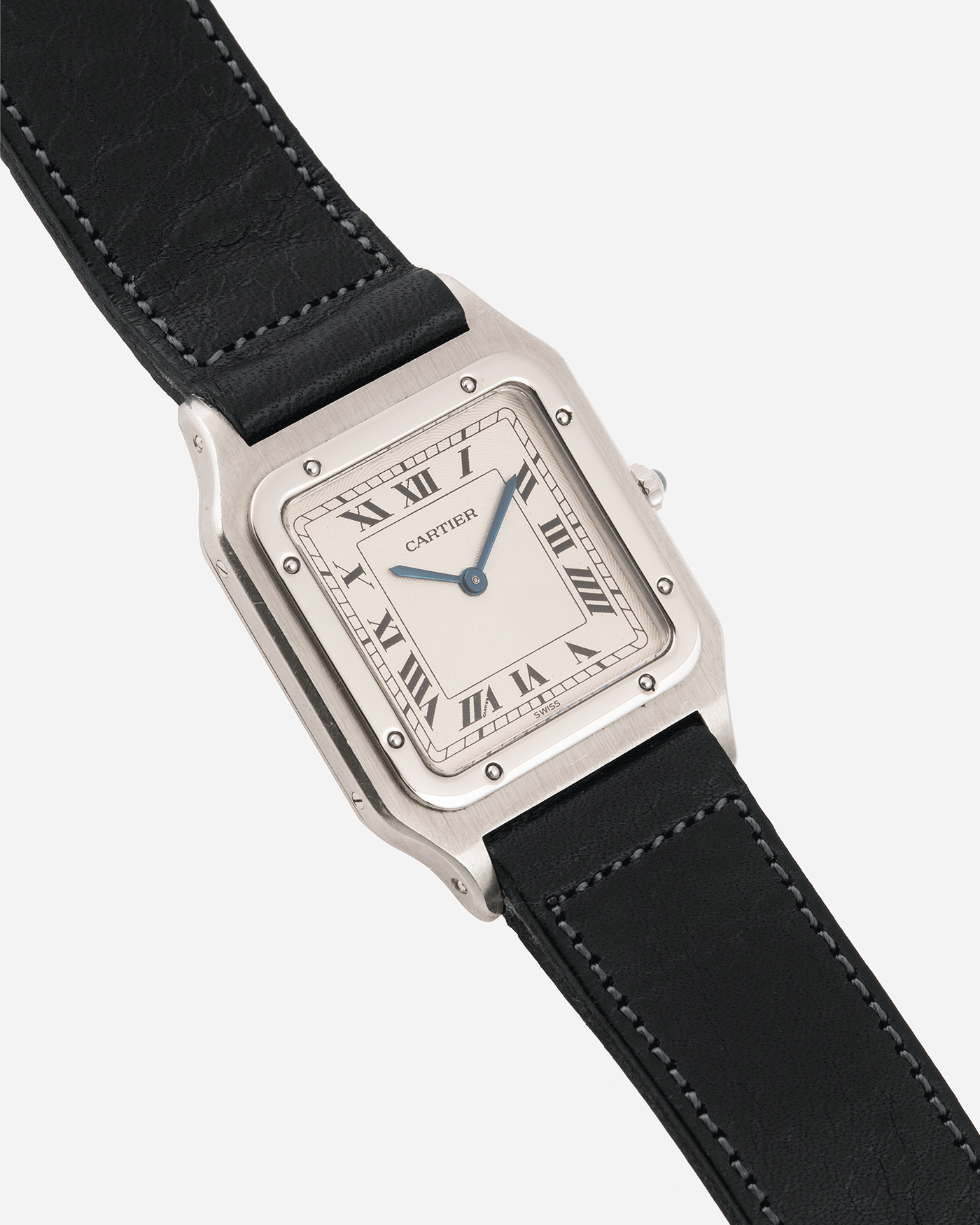 Brand: Cartier Year: 1990s Model: Santos Dumont Reference: 1575 Material: Platinum Movement: F.Piguet 21 Case Diameter: 27mm Strap: Accurate Form Navy Blue Japanese Calf and 18k White Gold Cartier Tang Buckle