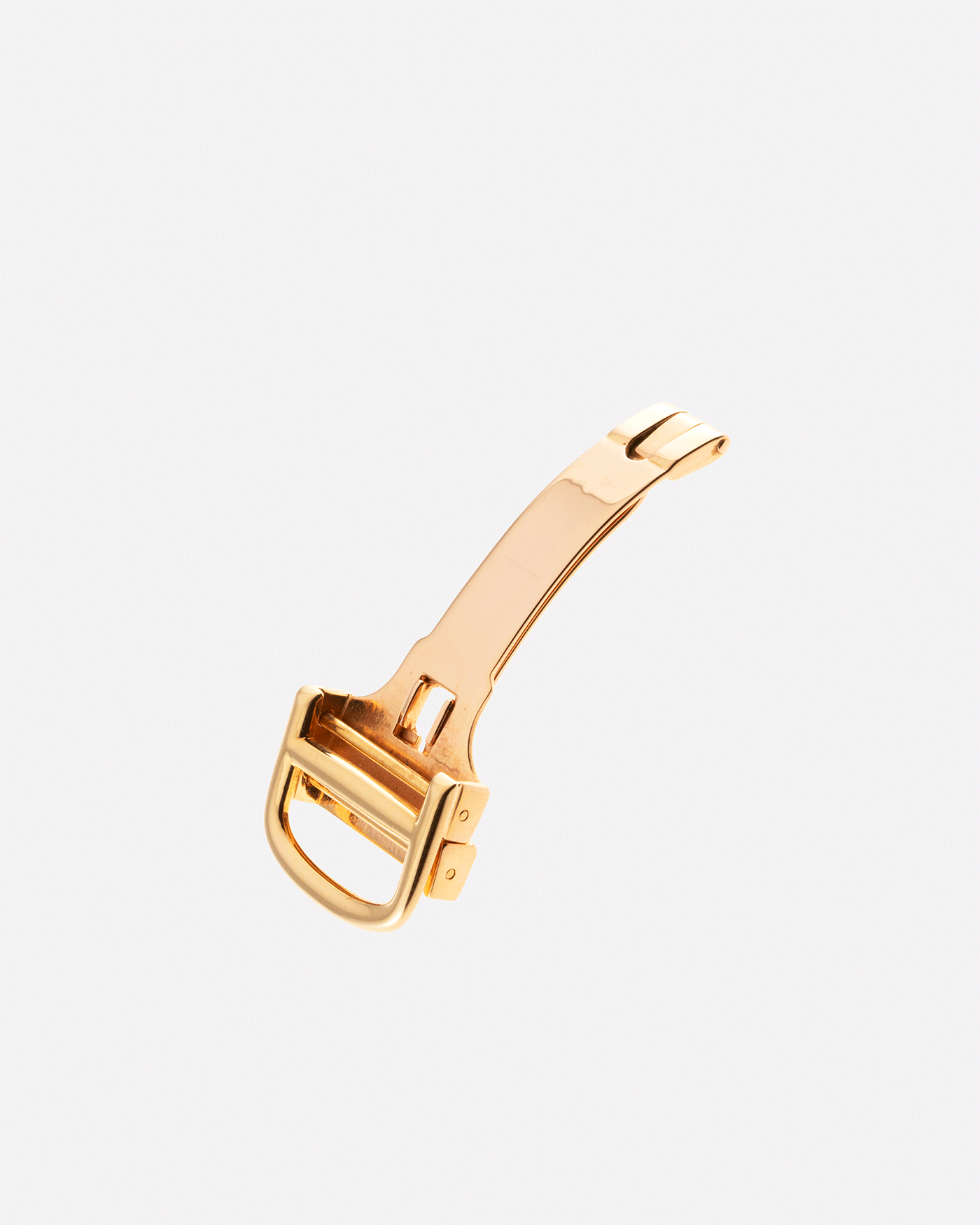 Brand: Cartier Year: 1990s Model: Santos Dumont Reference: 1576 Material: 18k Yellow Gold Movement: F.Piguet 21 Case Diameter: 27mm Strap: Accurate Form Navy Blue Japanese Calf and 18k Yellow Gold Cartier Deployant
