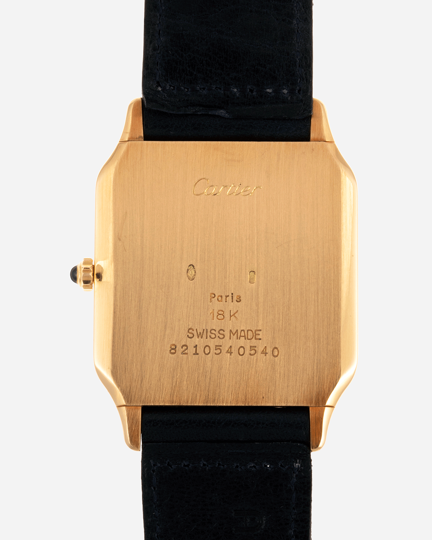 Brand: Cartier Year: 1990s Model: Santos Dumont Reference: 1576 Material: 18k Yellow Gold Movement: F.Piguet 21 Case Diameter: 27mm Strap: Accurate Form Navy Blue Japanese Calf and 18k Yellow Gold Cartier Deployant