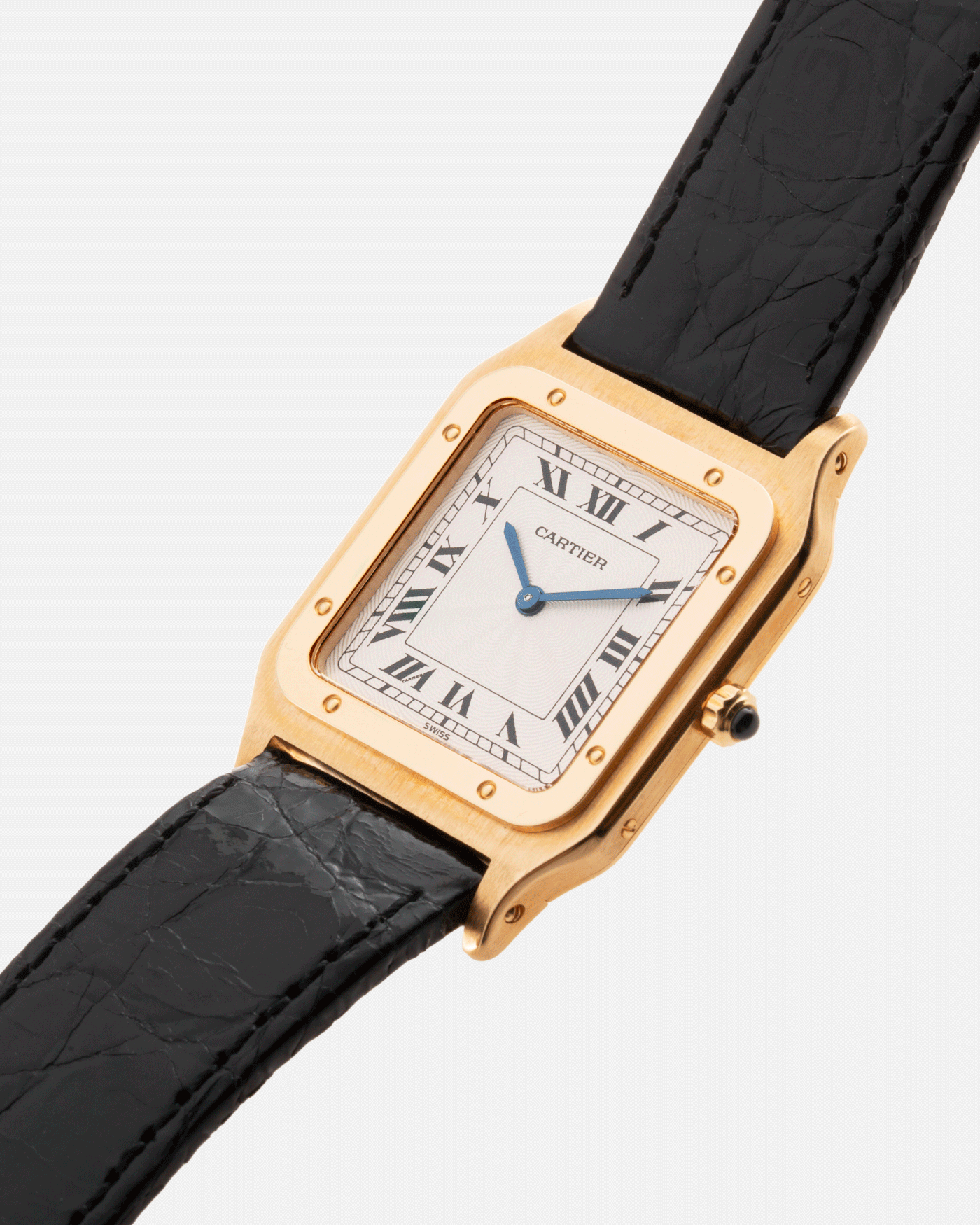 Brand: Cartier Year: 1990s Model: Santos Dumont Reference: 1576 Material: 18k Yellow Gold Movement: F.Piguet 21 Case Diameter: 27mm Strap: Black Leather Strap with Cartier 18k Yellow Gold Tang Buckle