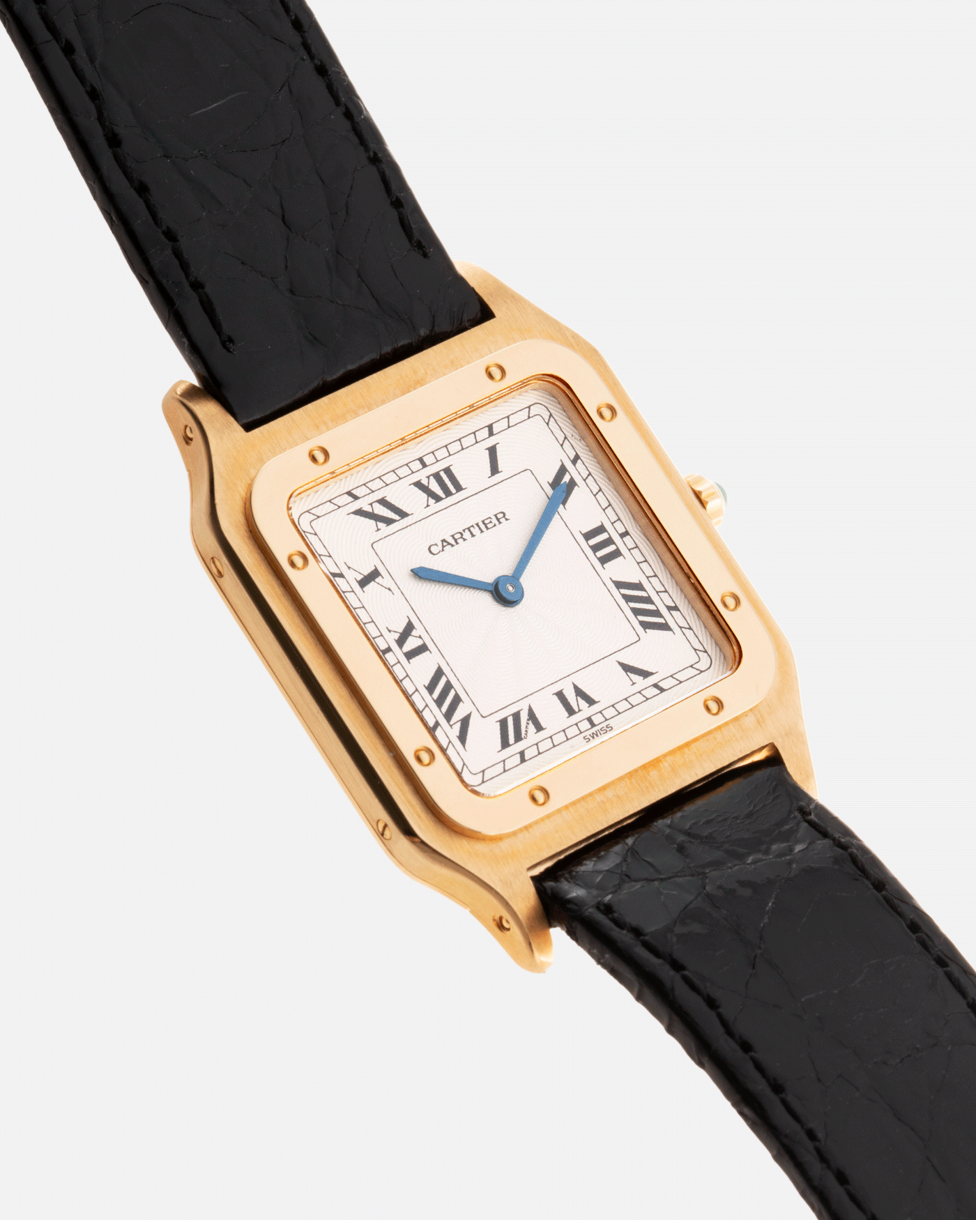 Brand: Cartier Year: 1990s Model: Santos Dumont Reference: 1576 Material: 18k Yellow Gold Movement: F.Piguet 21 Case Diameter: 27mm Strap: Black Leather Strap with Cartier 18k Yellow Gold Tang Buckle