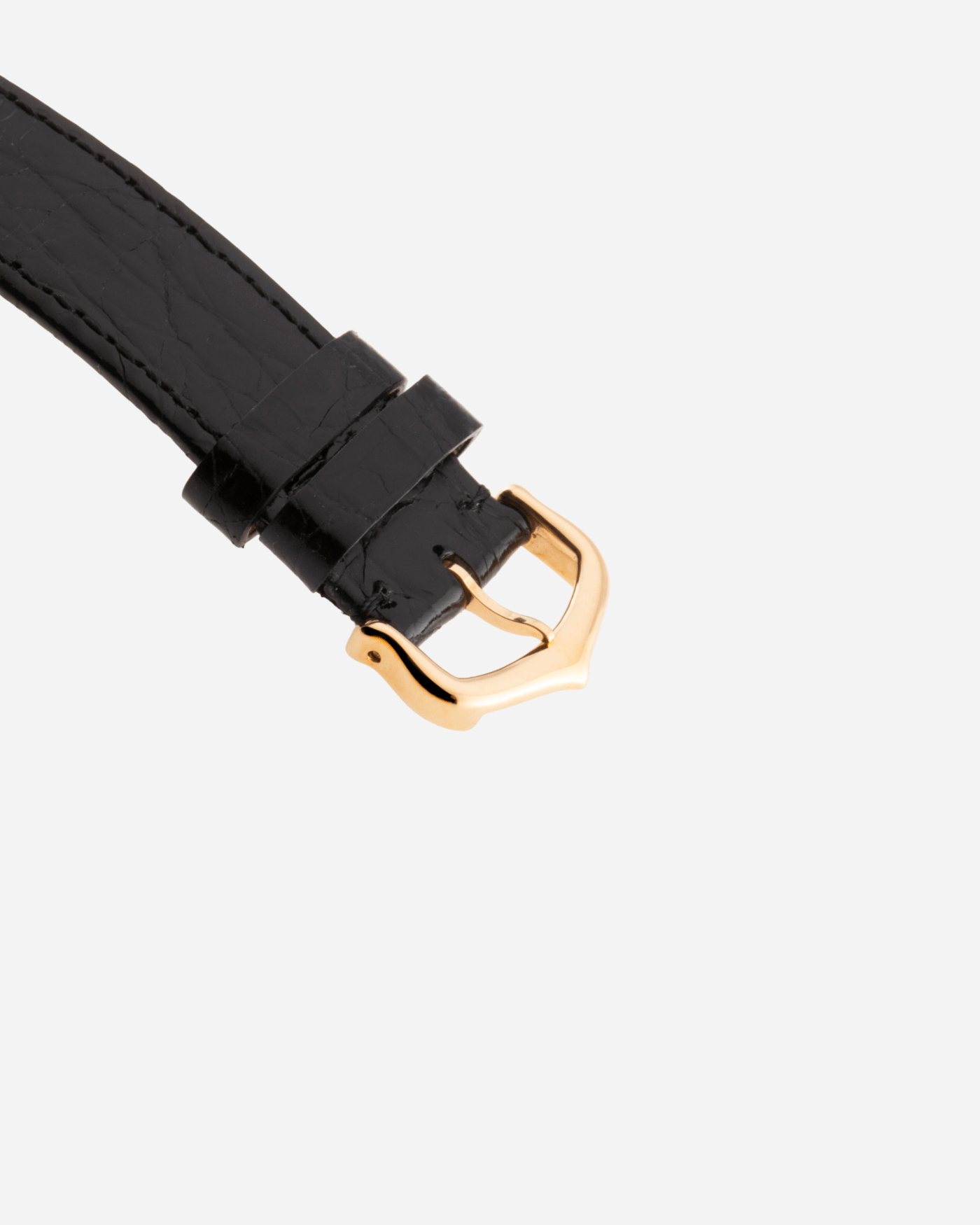Brand: Cartier Year: 1990s Model: Santos Dumont Reference: 1576 Material: 18k Yellow Gold Movement: F.Piguet 21 Case Diameter: 27mm Strap: Black Leather Strap with Cartier 18k Yellow Gold Tang Buckle
