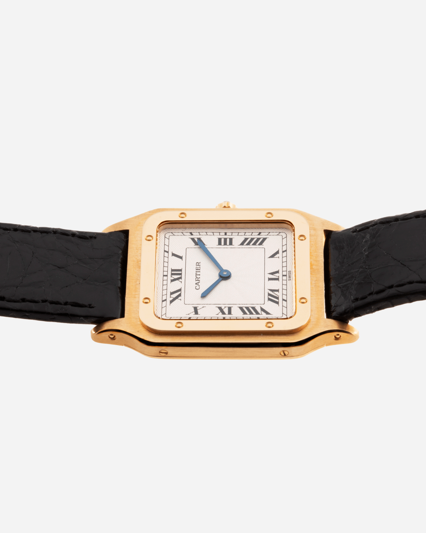 Brand: Cartier Year: 1990s Model: Santos Dumont Reference: 1576 Material: 18k Yellow Gold Movement: F.Piguet 21 Case Diameter: 27mm Strap: Black Leather Strap with Cartier 18k Yellow Gold Tang Buckle