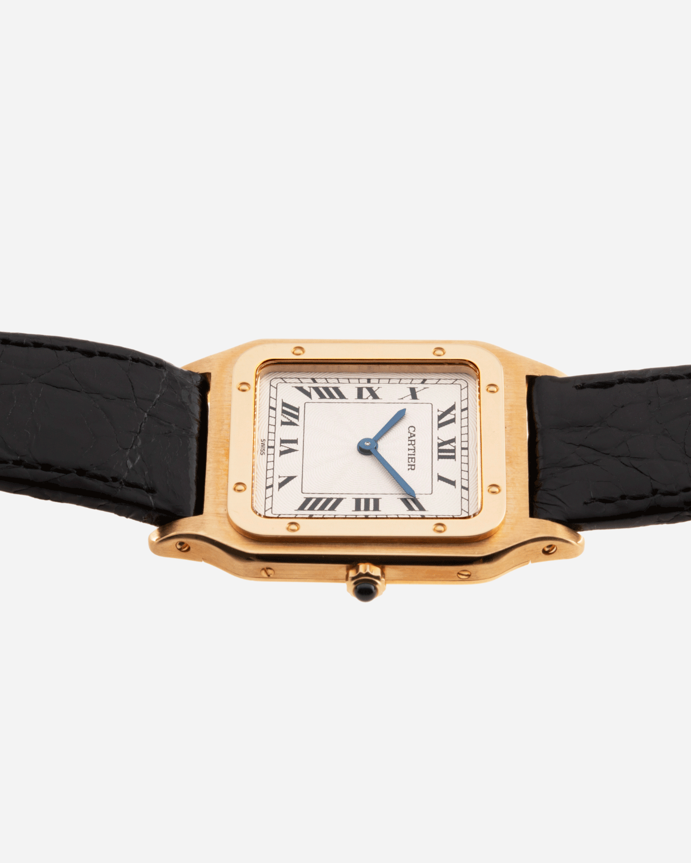 Brand: Cartier Year: 1990s Model: Santos Dumont Reference: 1576 Material: 18k Yellow Gold Movement: F.Piguet 21 Case Diameter: 27mm Strap: Black Leather Strap with Cartier 18k Yellow Gold Tang Buckle