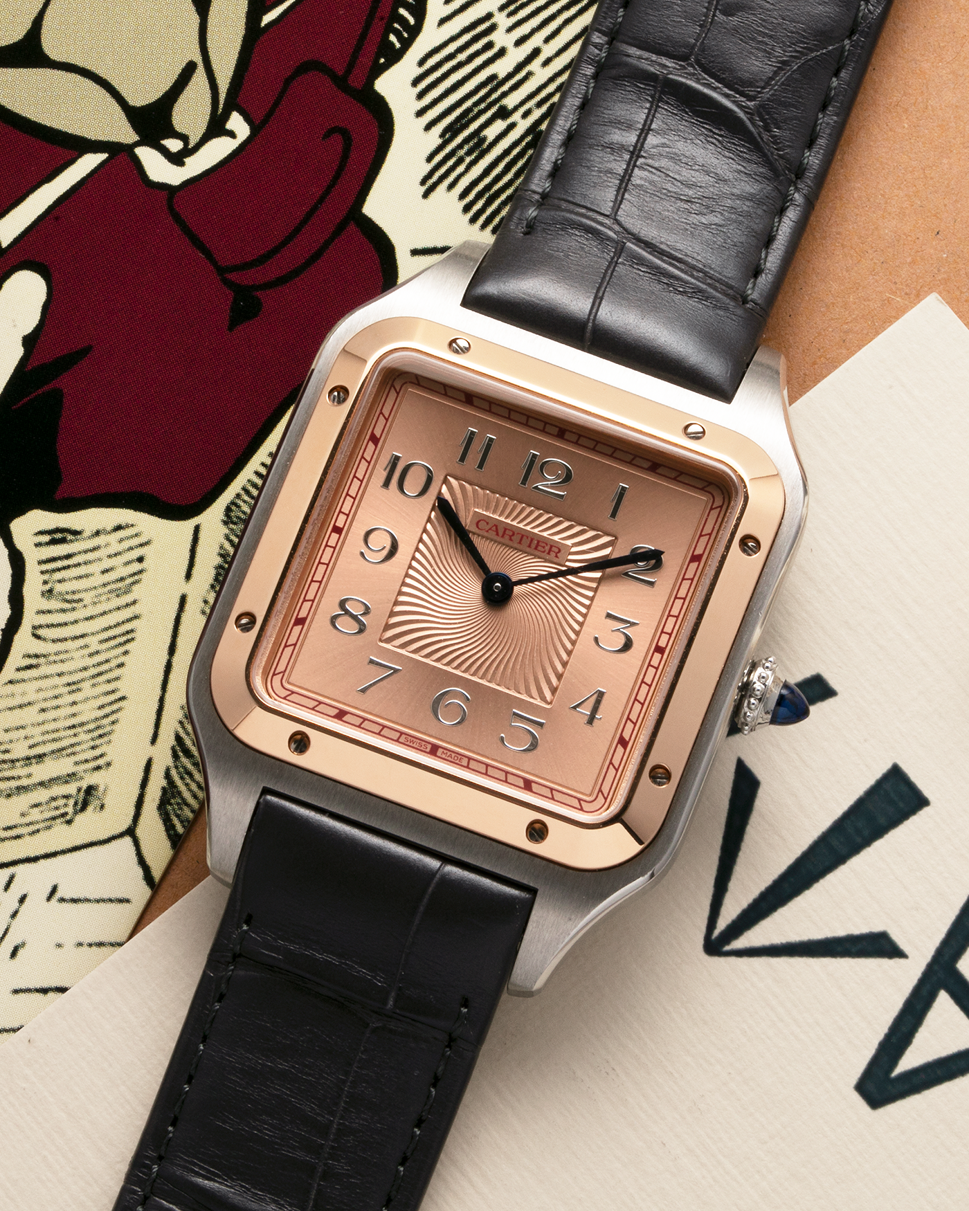 Brand: Cartier Year: 2021 Model: Santos-Dumont XL Reference Number: CRW2SA0025 Material: Stainless Steel Case and 18-carat Rose Gold Bezel Movement: Cartier Cal. 430 MC, Manual-Winding Case Diameter: 46.6mm x 33.9mm x 7.5mm Bracelet / Strap: Cartier Anthracite Grey Alligator Leather Strap with Signed Stainless Steel Tang Buckle