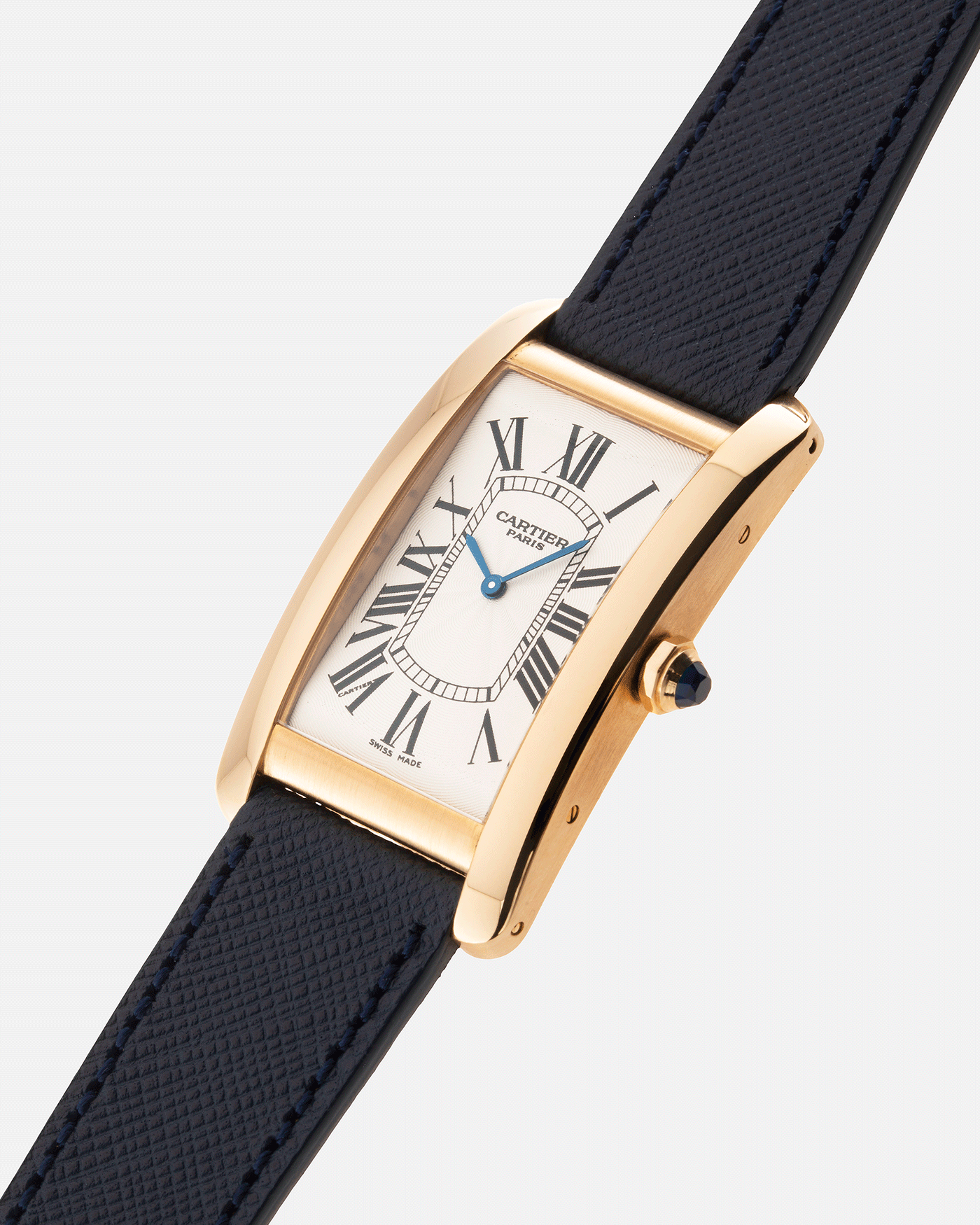 Brand: Cartier Year: 1990s Model: CPCP Collection Prive Tank Americaine Reference: 1735 Material: 18k Yellow Gold Movement: Cartier Caliber 430 MC Case Diameter: 45mm X26mm Strap: Navy Blue Molequin Textured Calf Strap with separate 18k Cartier Yellow Gold Deployant