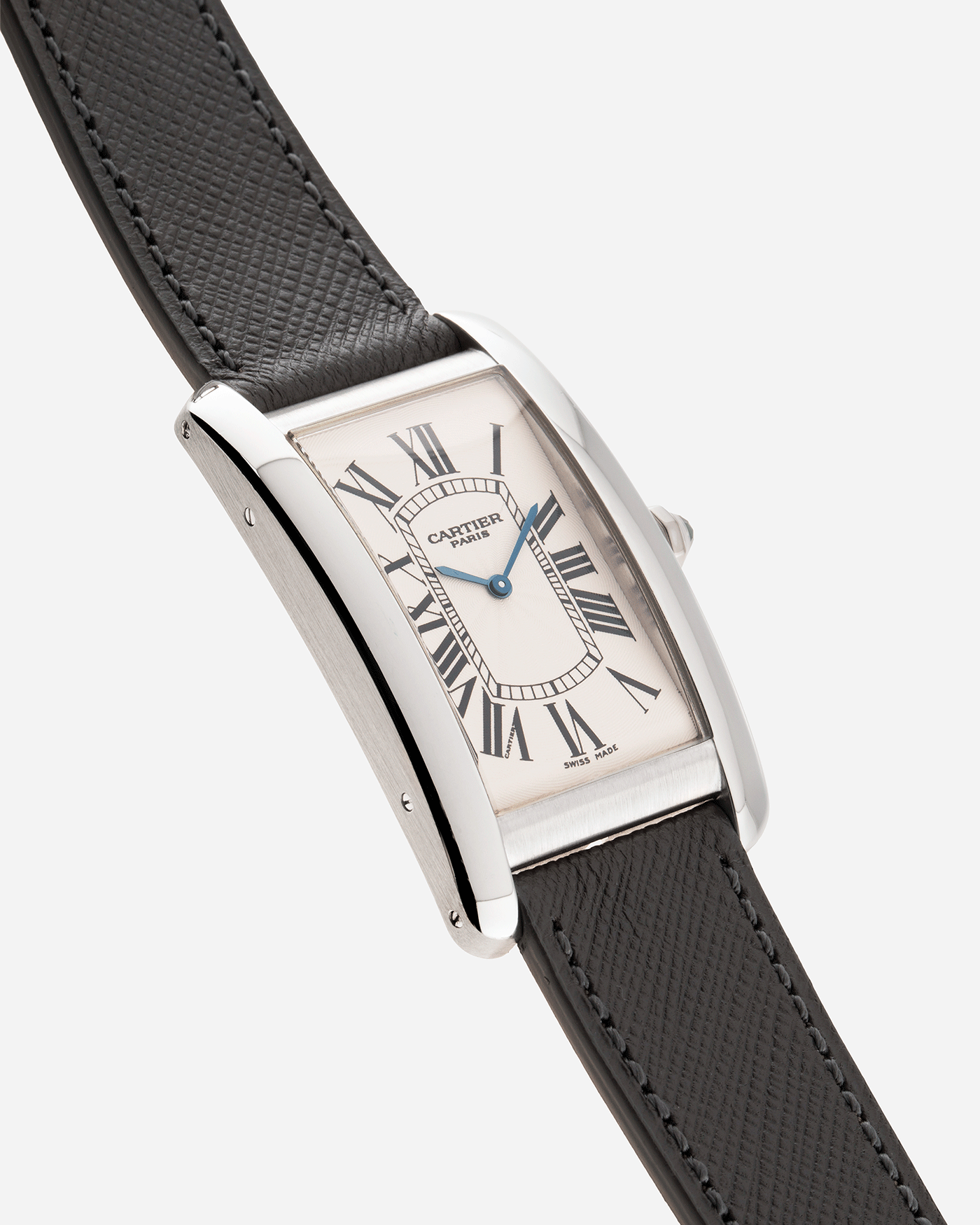 Brand: Cartier Year: 2007 Model: CPCP Collection Prive Tank Americaine Reference: 1734 Material: Platinum Movement: Cartier Caliber 430 MC Case Diameter: 45mm X26mm Strap: Grey Molequin Textured Calf Strap with separate White Gold Cartier Tang Buckle