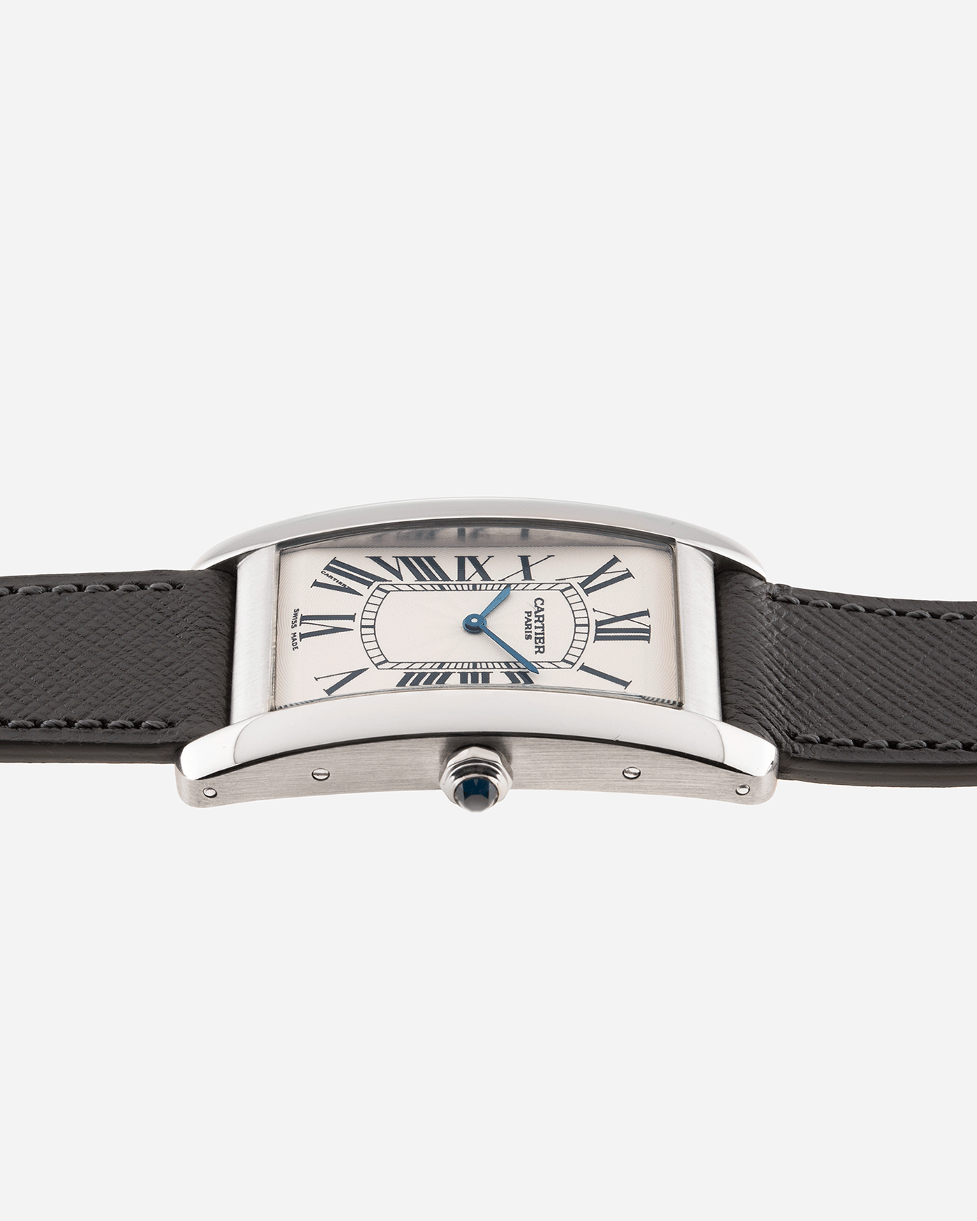 Brand: Cartier Year: 2007 Model: CPCP Collection Prive Tank Americaine Reference: 1734 Material: Platinum Movement: Cartier Caliber 430 MC Case Diameter: 45mm X26mm Strap: Grey Molequin Textured Calf Strap with separate White Gold Cartier Tang Buckle