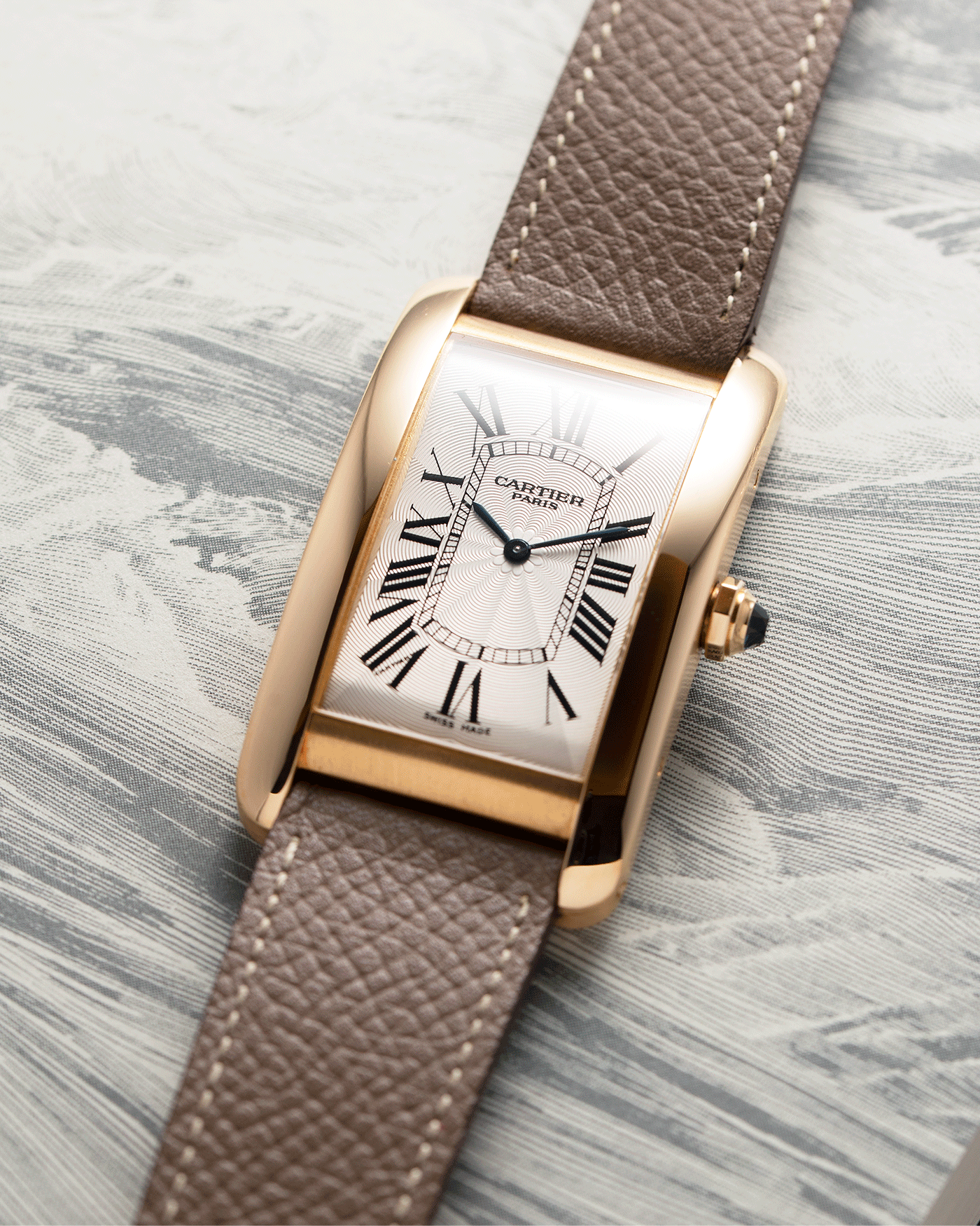 Brand: Cartier Year: 1999 Model: CPCP Collection Prive Tank Americaine Reference: 1737 Material: 18k Yellow Gold Movement: Cartier Caliber 430 MC Case Diameter: 45mmX26mm Strap: Nostime Taupe Grained Calf