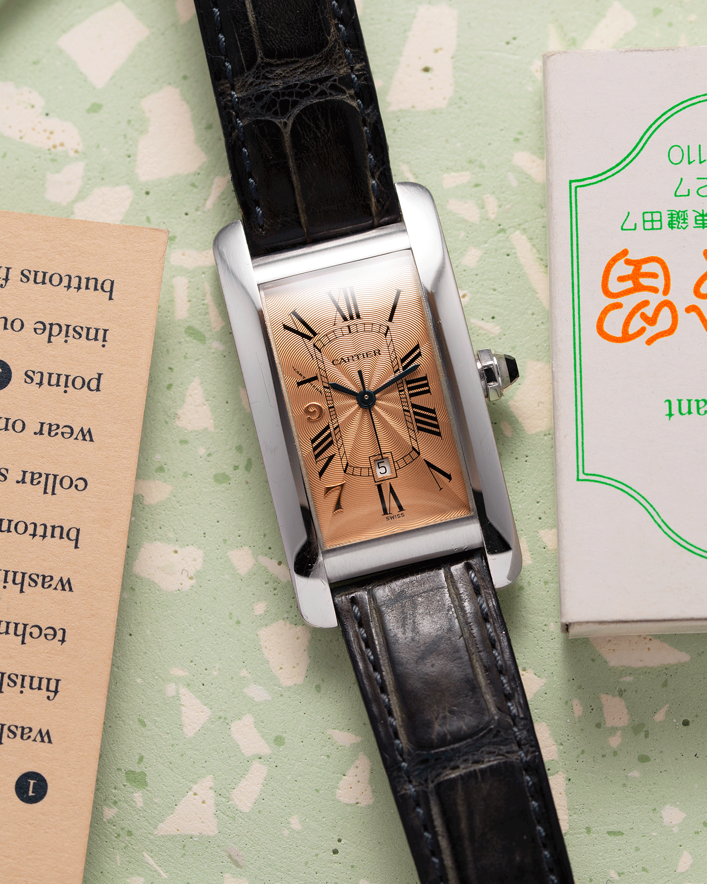 Brand: Cartier Year: 1997 Model: Tank Americaine Hong Kong Limited Edition Reference: 1726 Material: 18k White Gold Movement: Automatic Cartier Self Winding Caliber Case Diameter: 41mm X 23mm Strap: Cartier Green Alligator Strap with White Gold Cartier Buckle