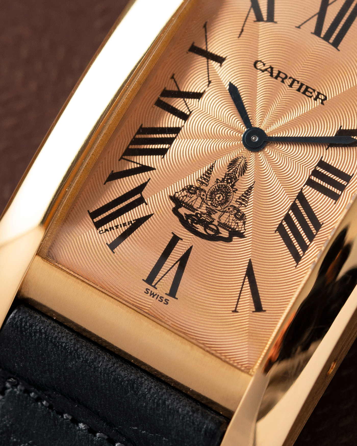 Brand: Cartier Year: 1996 Model: Tank Americaine ‘Thai King’ Reference: 1735 Material: 18k Yellow Gold Movement: Cartier Caliber 430 MC Case Diameter: 45mm X26mm Strap: Navy Blue Accurate Form Calf Strap with separate 18k Cartier Yellow Gold Deployant