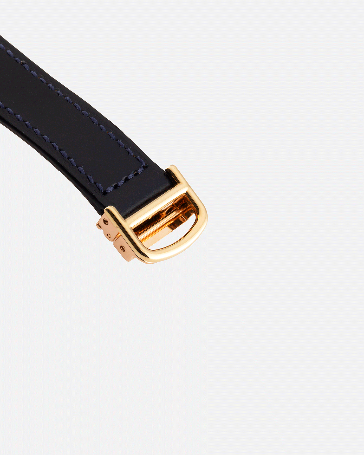 Brand: Cartier Year: 1996 Model: Tank Asymmetrique Limited Reference Number: 2488 Material: 18k Yellow Gold Movement: Cartier Cal. 9P2 Case Diameter: 23mm X 33mm Strap: Nostime Blue Leather with 18k Cartier Yellow Gold Deployant