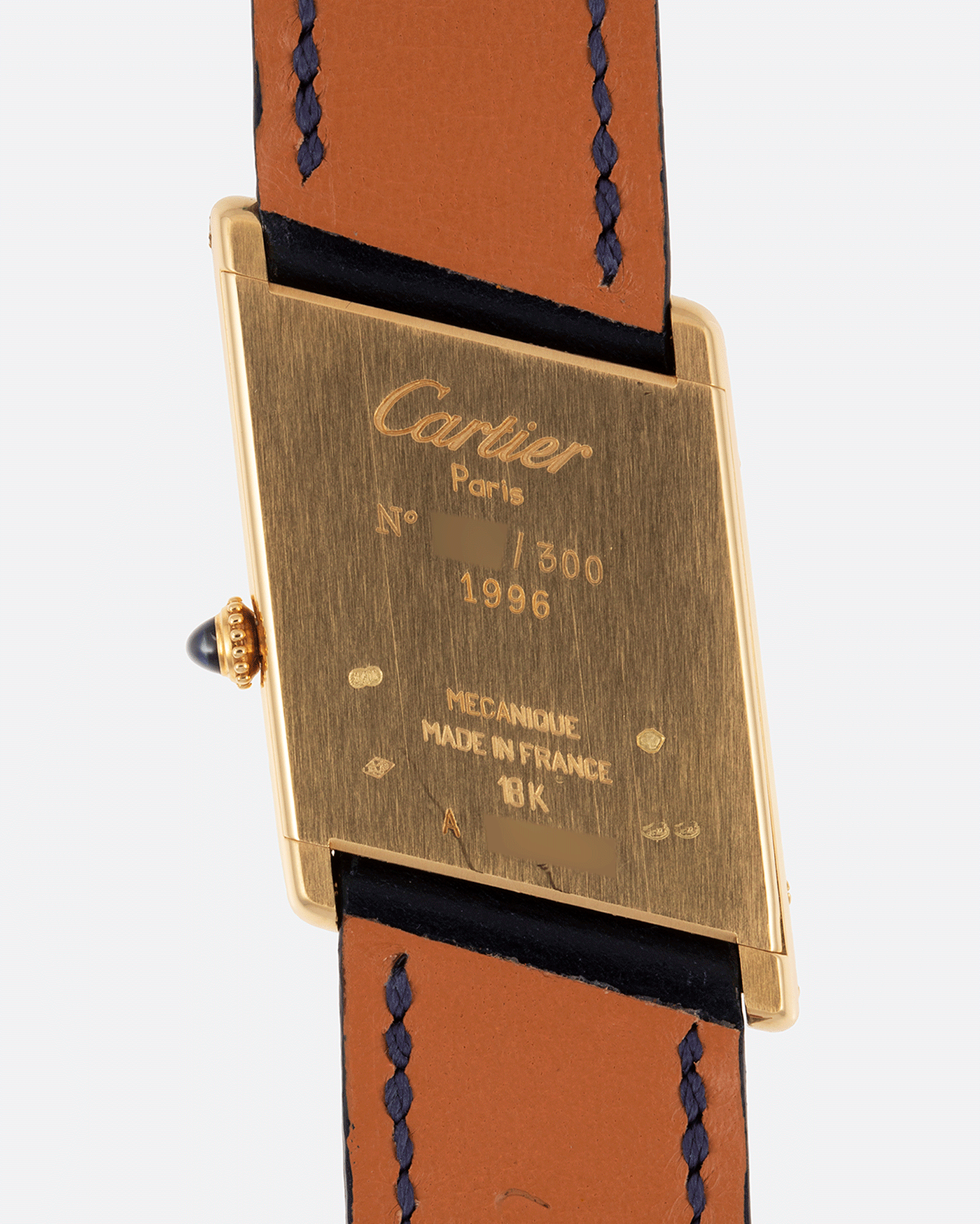Brand: Cartier Year: 1996 Model: Tank Asymmetrique Limited Reference Number: 2488 Material: 18k Yellow Gold Movement: Cartier Cal. 9P2 Case Diameter: 23mm X 33mm Strap: Nostime Blue Leather with 18k Cartier Yellow Gold Deployant