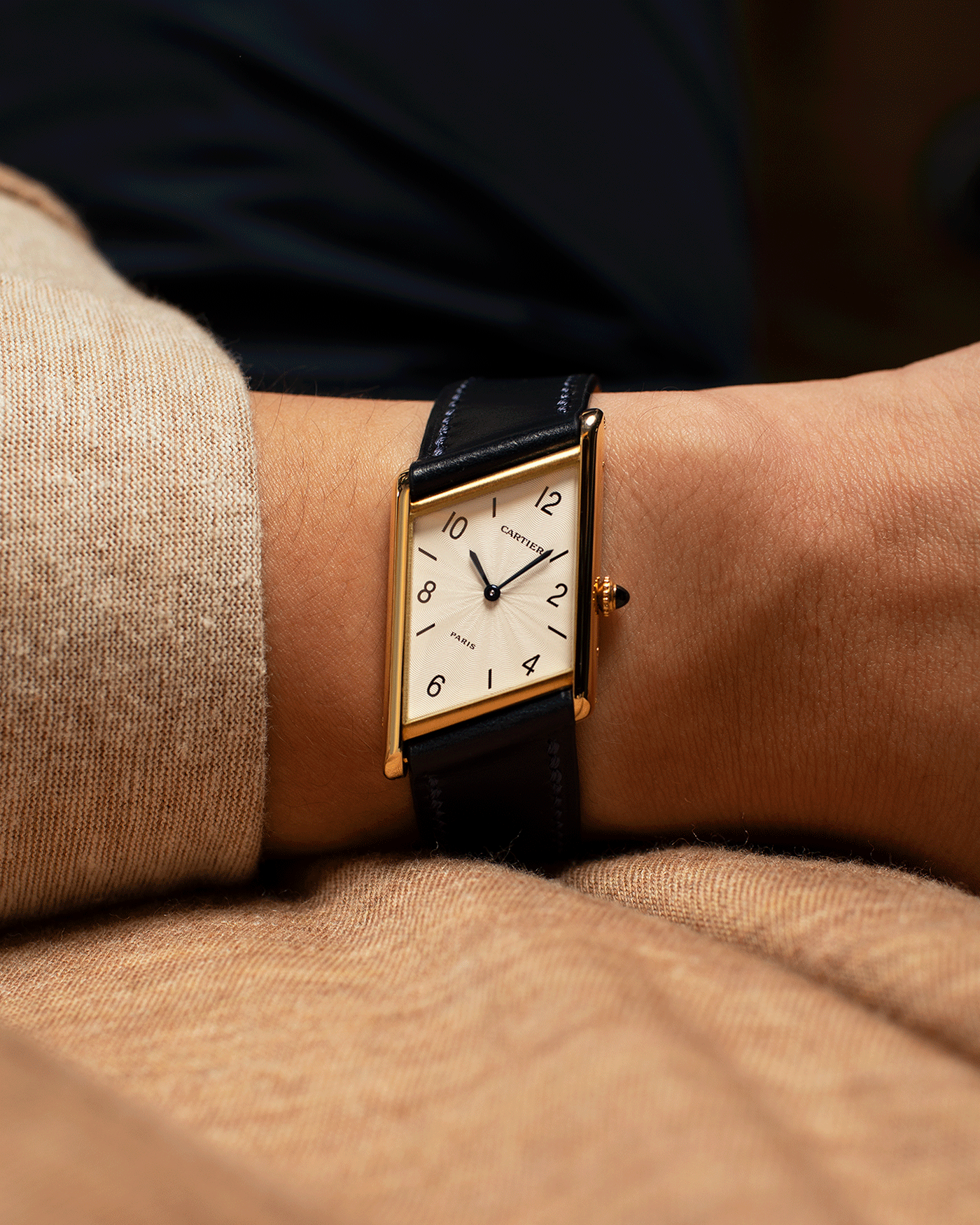 Brand: Cartier Year: 1996 Model: Tank Asymmetrique Limited Reference Number: 2488 Material: 18k Yellow Gold Movement: Cartier Cal. 9P2 Case Diameter: 23mm X 33mm Strap: Nostime Blue Leather with 18k Cartier Yellow Gold Deployant