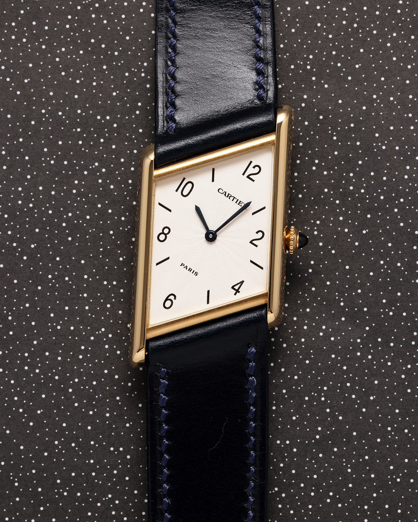 Brand: Cartier Year: 1996 Model: Tank Asymmetrique Limited Reference Number: 2488 Material: 18k Yellow Gold Movement: Cartier Cal. 9P2 Case Diameter: 23mm X 33mm Strap: Nostime Blue Leather with 18k Cartier Yellow Gold Deployant