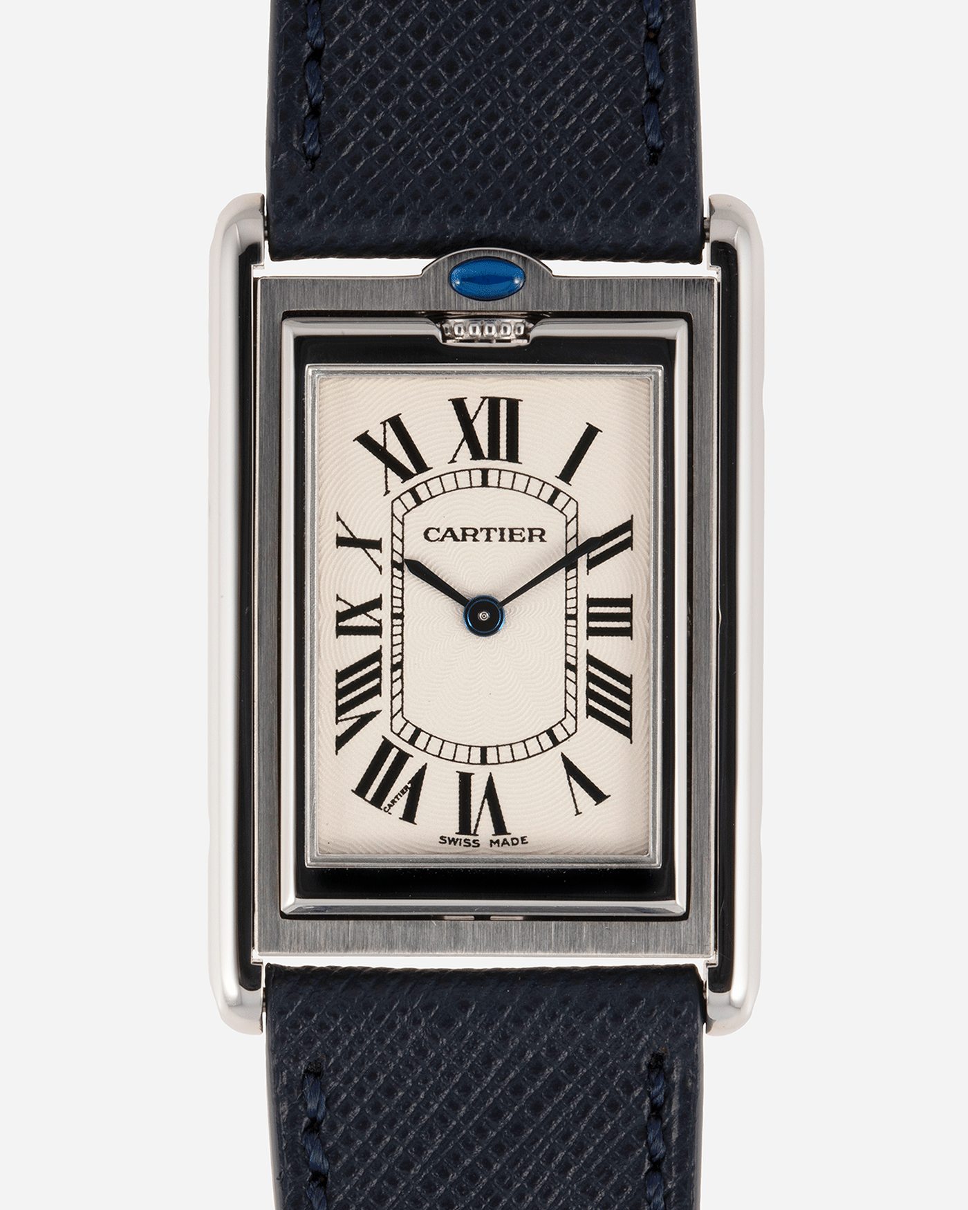 Brand: Cartier Year: 2001 Model: Tank Basculante Millenium Reference: 2390 Material: Stainless Steel Movement: Piguet-derived Cartier cal. 050 MC Case Diameter: 26 x 38mm Strap: Navy Blue Molequin Textured Calf Strap with separate Stainless Steel Cartier Tang Buckle