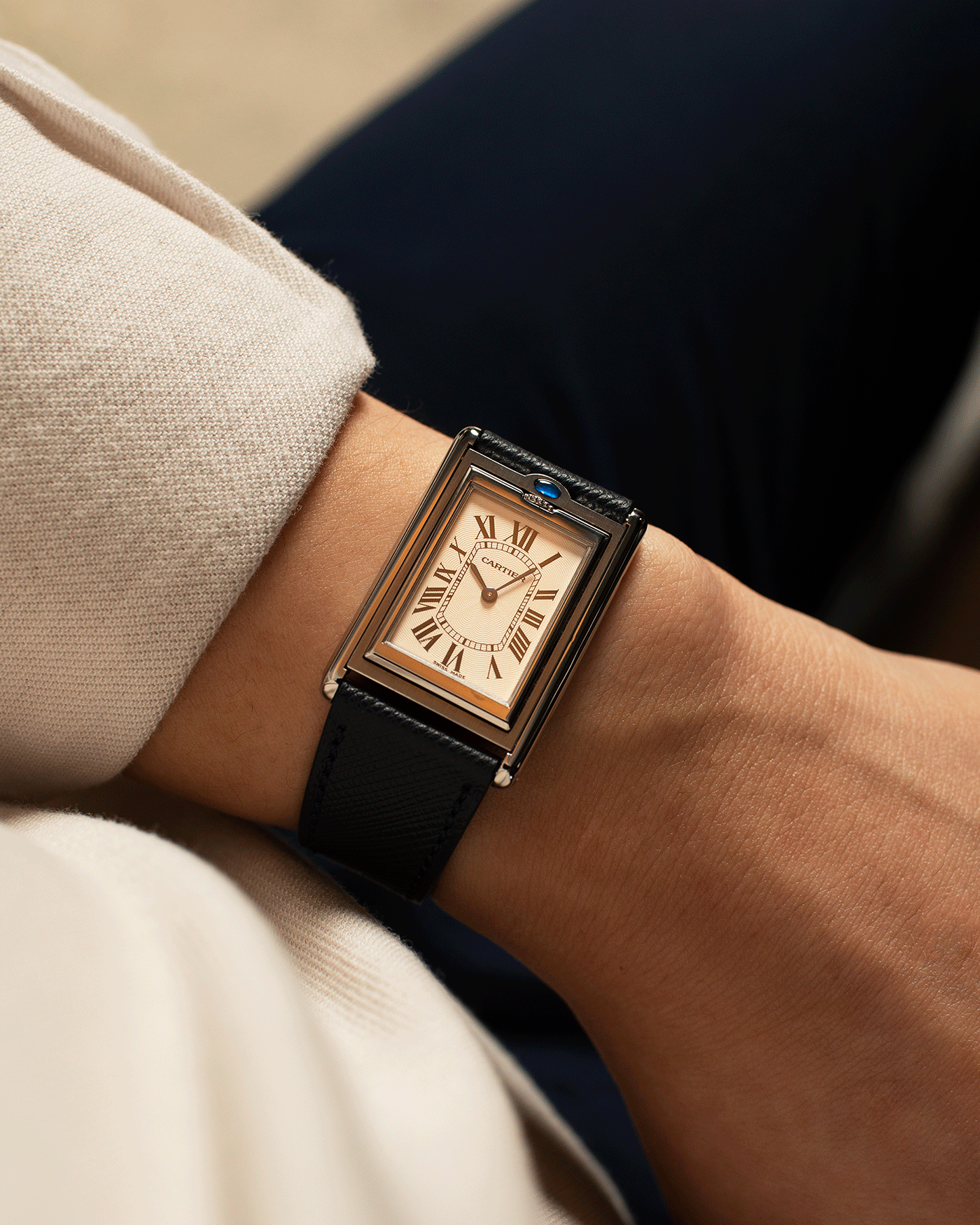 Brand: Cartier Year: 2001 Model: Tank Basculante Millenium Reference: 2390 Material: Stainless Steel Movement: Piguet-derived Cartier cal. 050 MC Case Diameter: 26 x 38mm Strap: Navy Blue Molequin Textured Calf Strap with separate Stainless Steel Cartier Tang Buckle