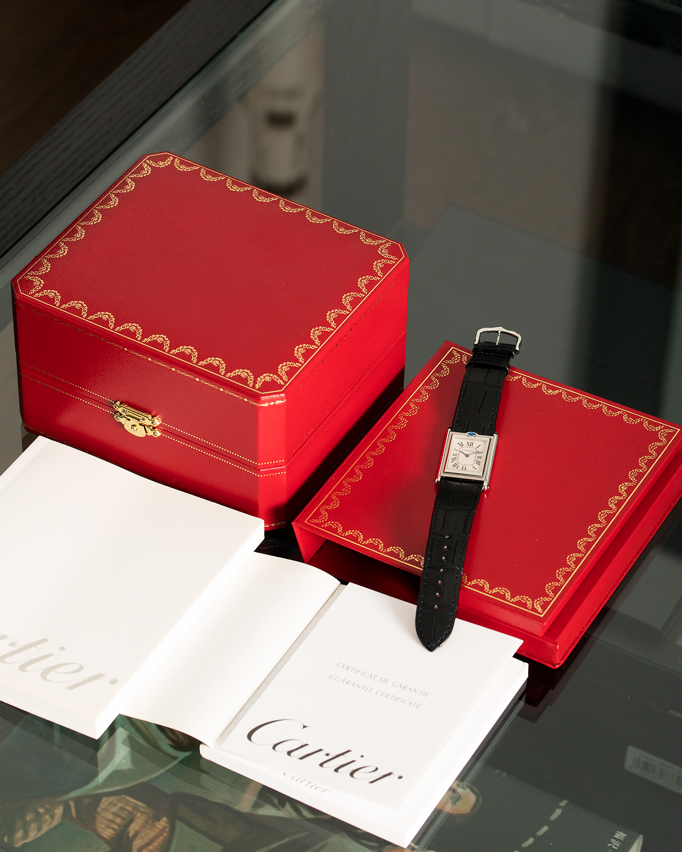 Brand: Cartier Year: 1990’s Model: Tank Basculante Reference: 2390 Material: Stainless Steel Movement: Piguet-derived Cartier cal. 050 MC Case Diameter: 26 x 38mm Strap: Black Cartier Alligator with Cartier Stainless Steel Tang Buckle
