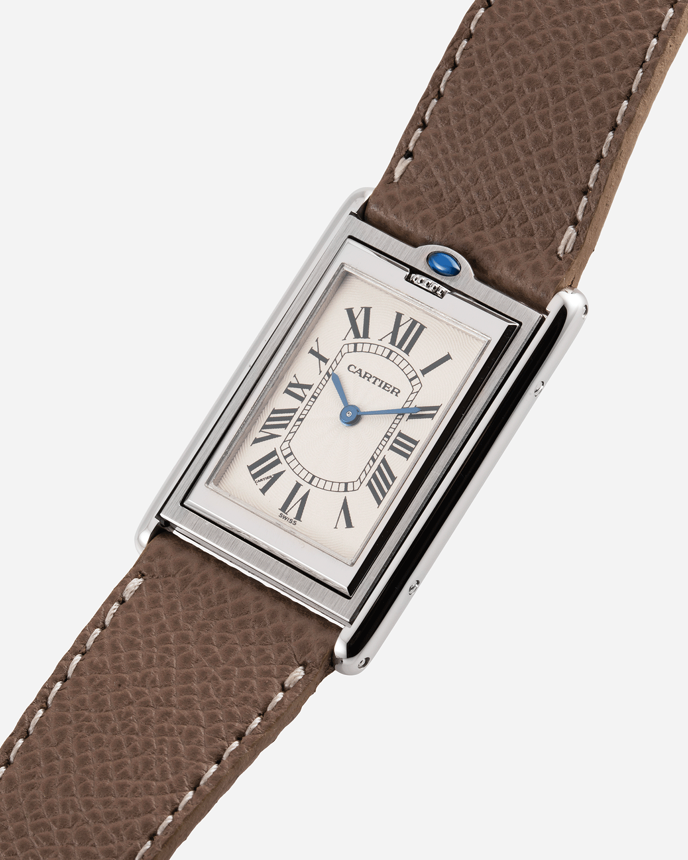  Brand: Cartier Year: 1999 Model: Tank Basculante Reference: 2390 Material: Stainless Steel Movement: Piguet-derived Cartier cal. 050 MC Case Diameter: 26 x 38mm Strap: Veblenist Taupe Grained Calf and Black Cartier Alligator with Cartier Stainless Steel Tang Buckle