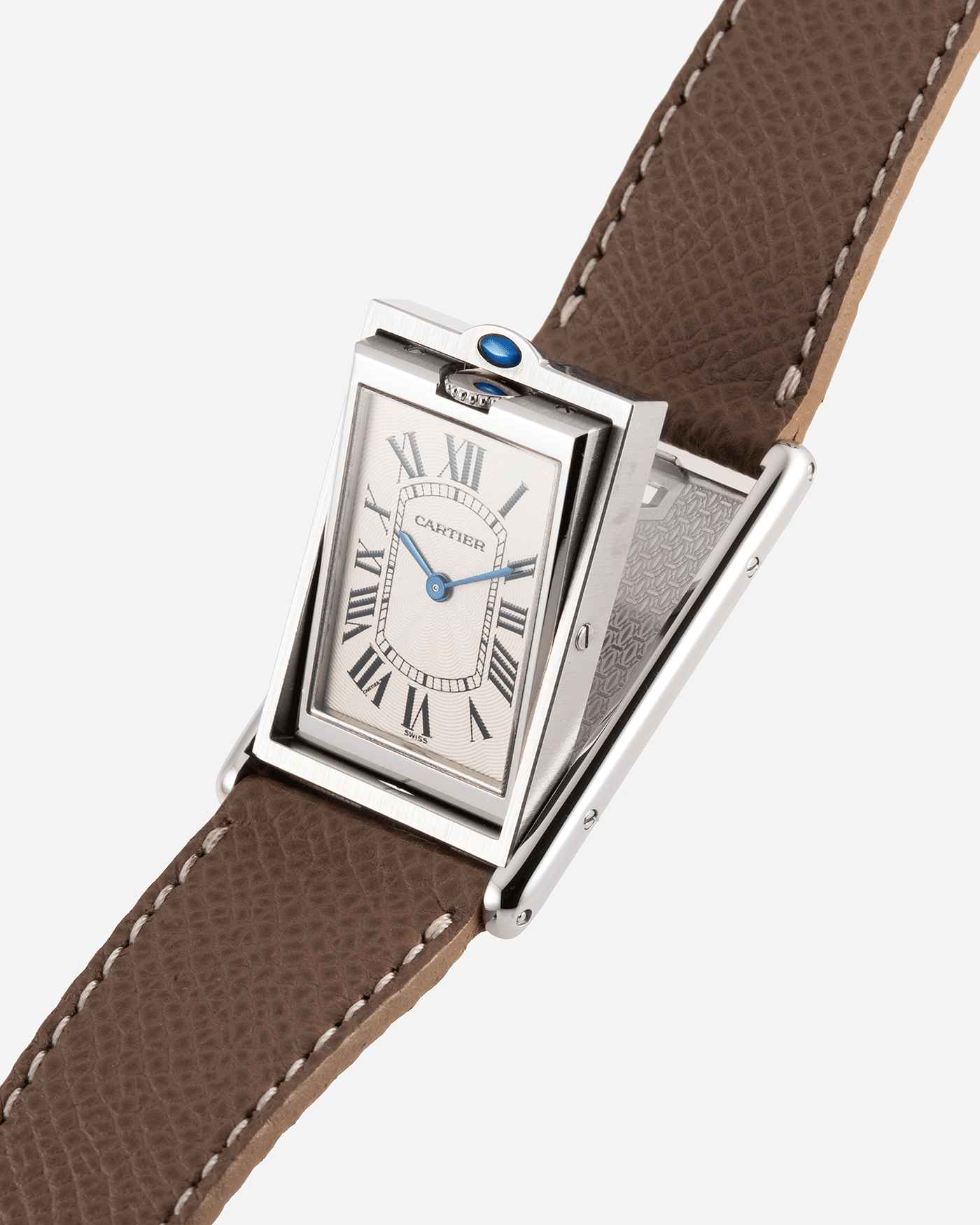  Brand: Cartier Year: 1999 Model: Tank Basculante Reference: 2390 Material: Stainless Steel Movement: Piguet-derived Cartier cal. 050 MC Case Diameter: 26 x 38mm Strap: Veblenist Taupe Grained Calf and Black Cartier Alligator with Cartier Stainless Steel Tang Buckle
