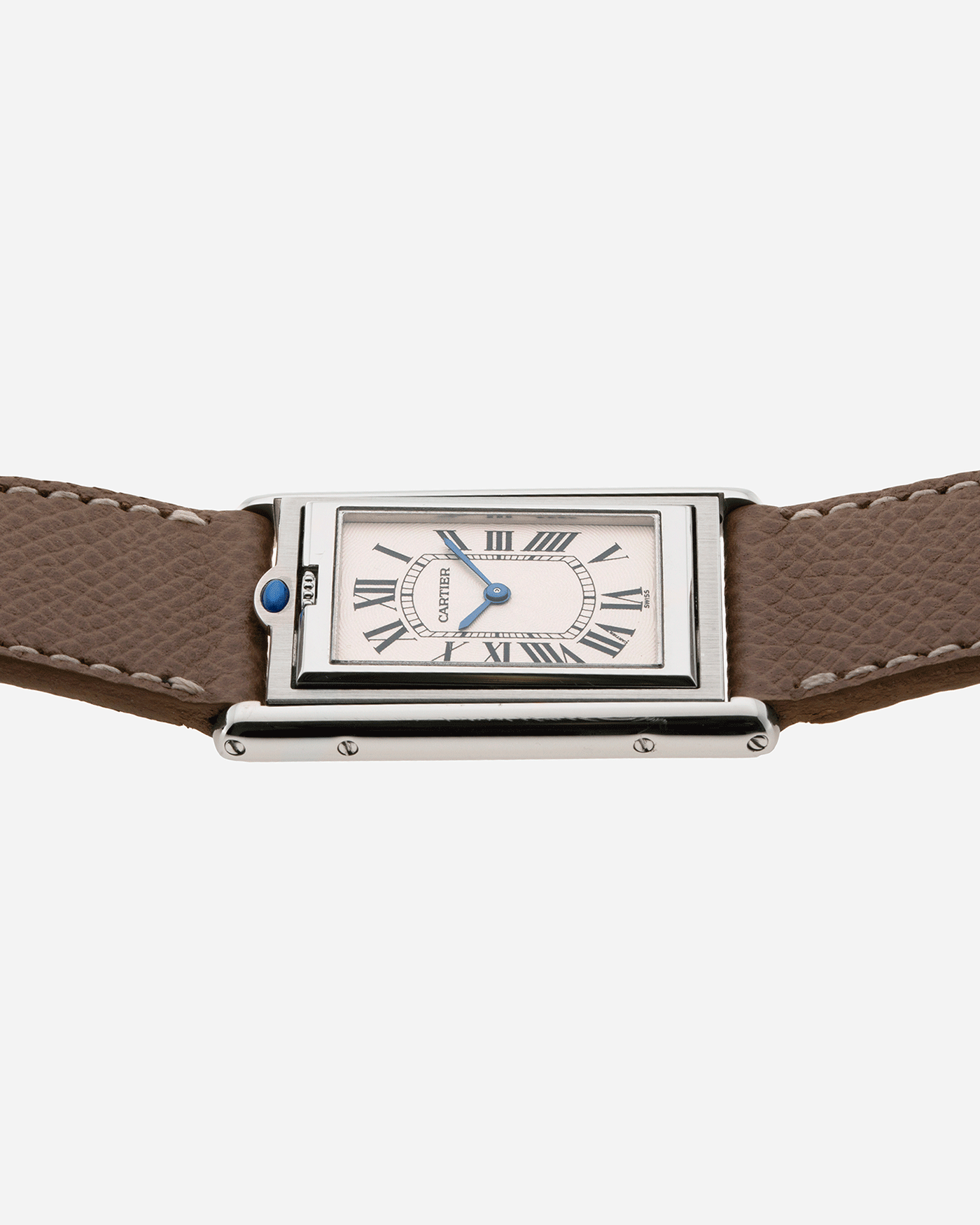  Brand: Cartier Year: 1999 Model: Tank Basculante Reference: 2390 Material: Stainless Steel Movement: Piguet-derived Cartier cal. 050 MC Case Diameter: 26 x 38mm Strap: Veblenist Taupe Grained Calf and Black Cartier Alligator with Cartier Stainless Steel Tang Buckle