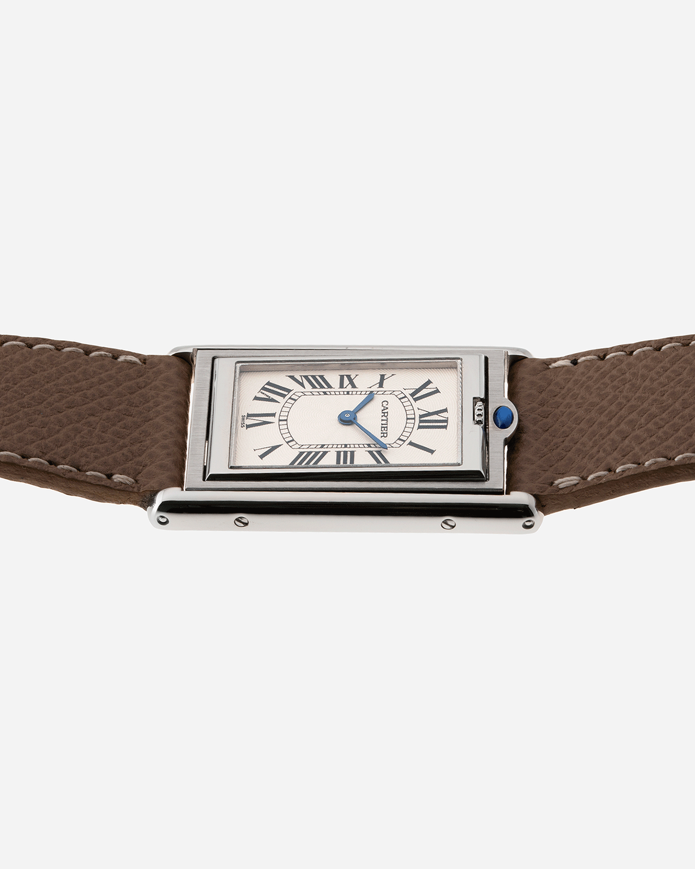  Brand: Cartier Year: 1999 Model: Tank Basculante Reference: 2390 Material: Stainless Steel Movement: Piguet-derived Cartier cal. 050 MC Case Diameter: 26 x 38mm Strap: Veblenist Taupe Grained Calf and Black Cartier Alligator with Cartier Stainless Steel Tang Buckle
