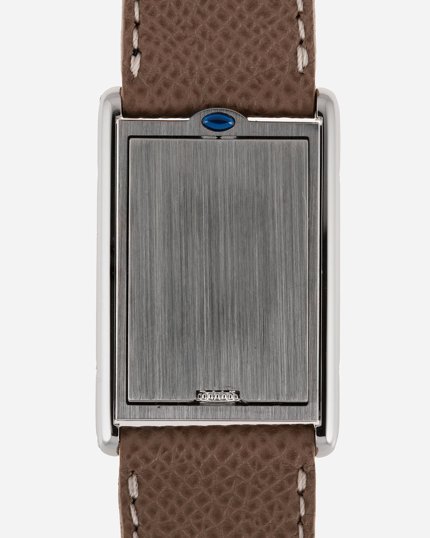  Brand: Cartier Year: 1999 Model: Tank Basculante Reference: 2390 Material: Stainless Steel Movement: Piguet-derived Cartier cal. 050 MC Case Diameter: 26 x 38mm Strap: Veblenist Taupe Grained Calf and Black Cartier Alligator with Cartier Stainless Steel Tang Buckle