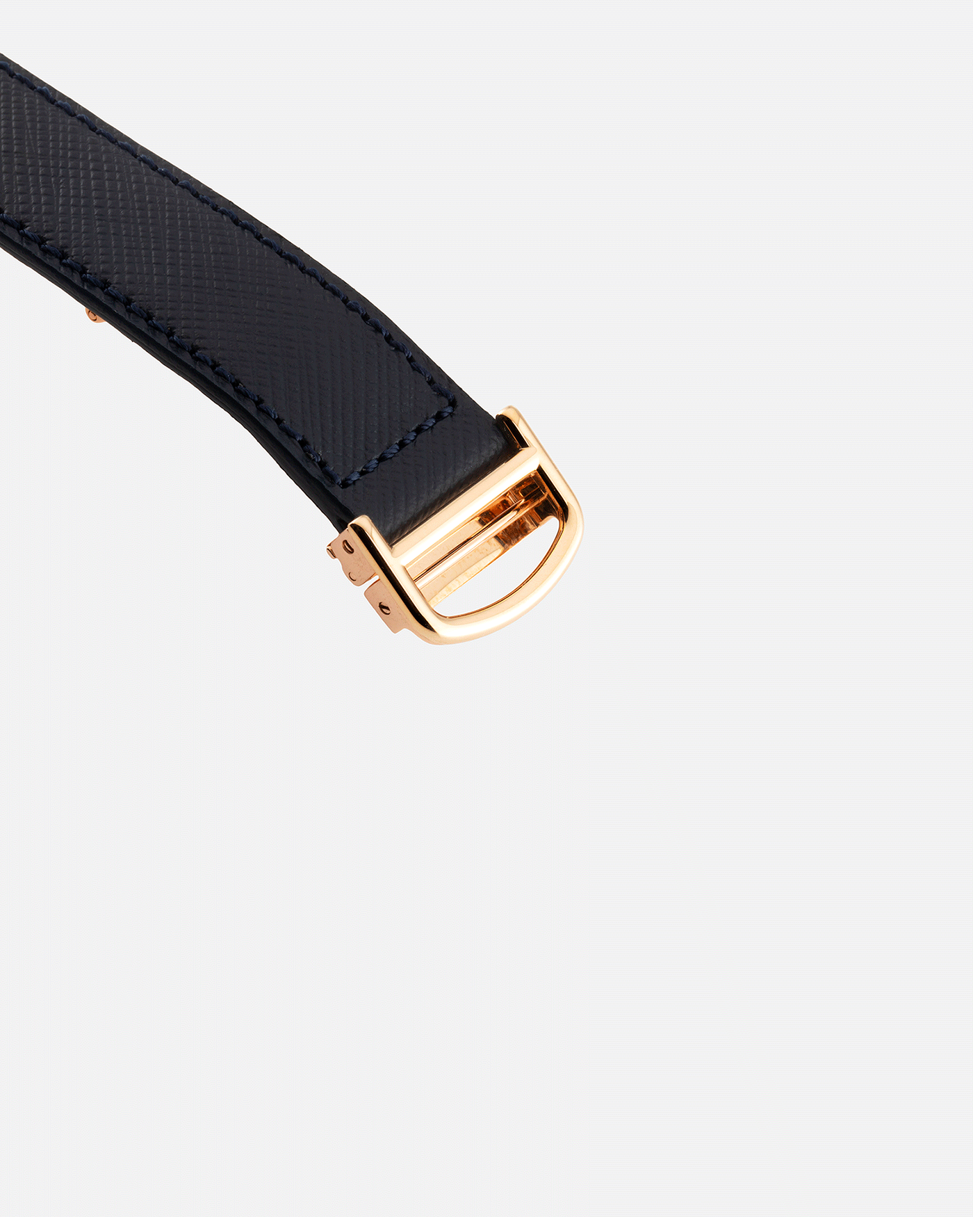 Brand: Cartier Year: 2000 Model: Tank Basculante Material: 18k Yellow Gold Movement: Cartier Cal. 610 (F. Piguet) Case Diameter: 25mm x 39mm Strap: Molequin Navy Blue Textured Calf and 18k Yellow Gold Deployant Clasp