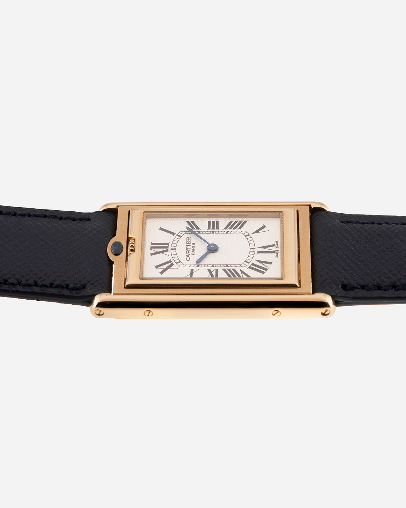 Brand: Cartier Year: 2000 Model: Tank Basculante Material: 18k Yellow Gold Movement: Cartier Cal. 610 (F. Piguet) Case Diameter: 25mm x 39mm Strap: Molequin Navy Blue Textured Calf and 18k Yellow Gold Deployant Clasp